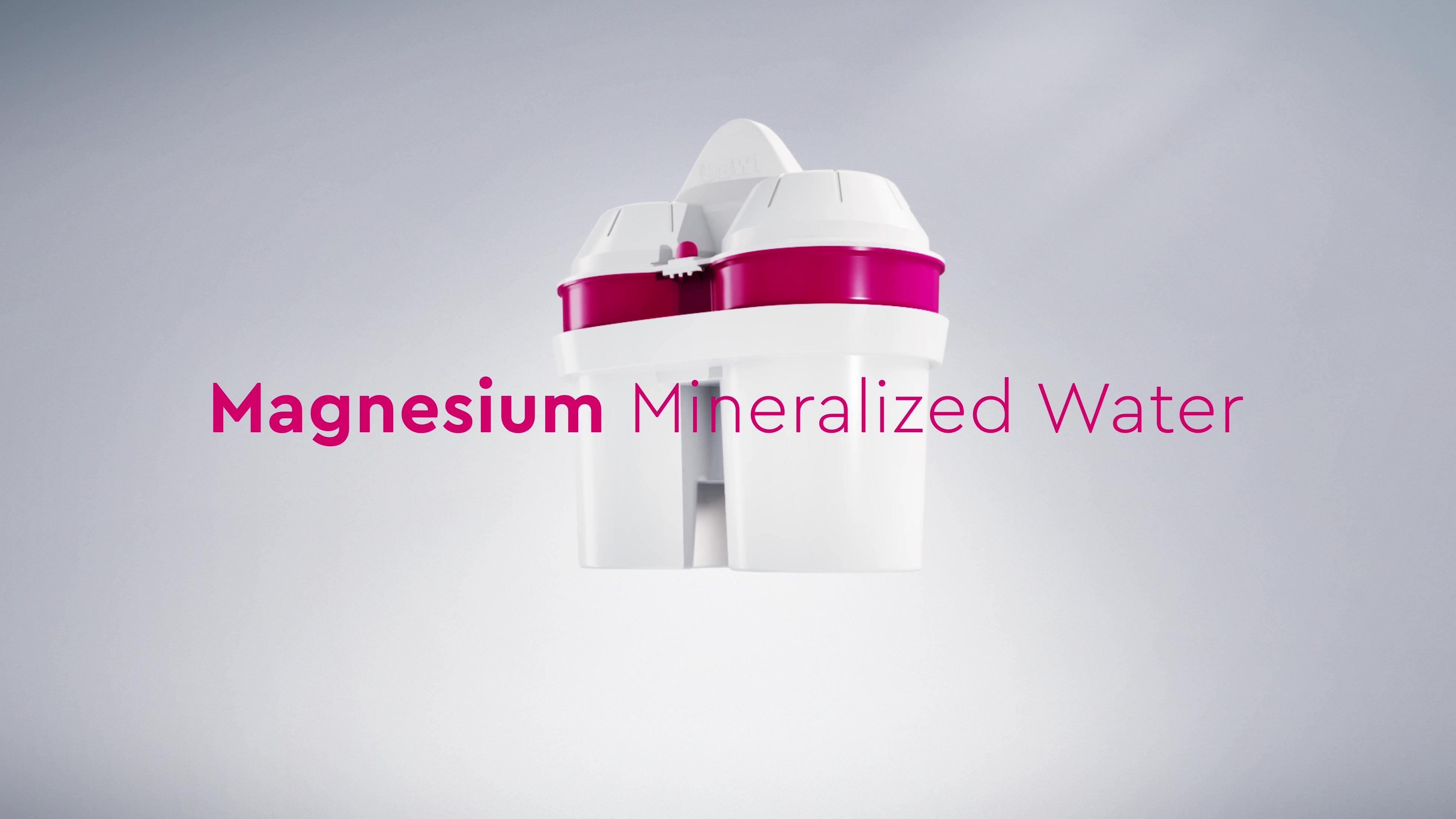 Biały filtr wody z różowymi elementami. Tekst na obrazie: Magnesium Mineralized Water.