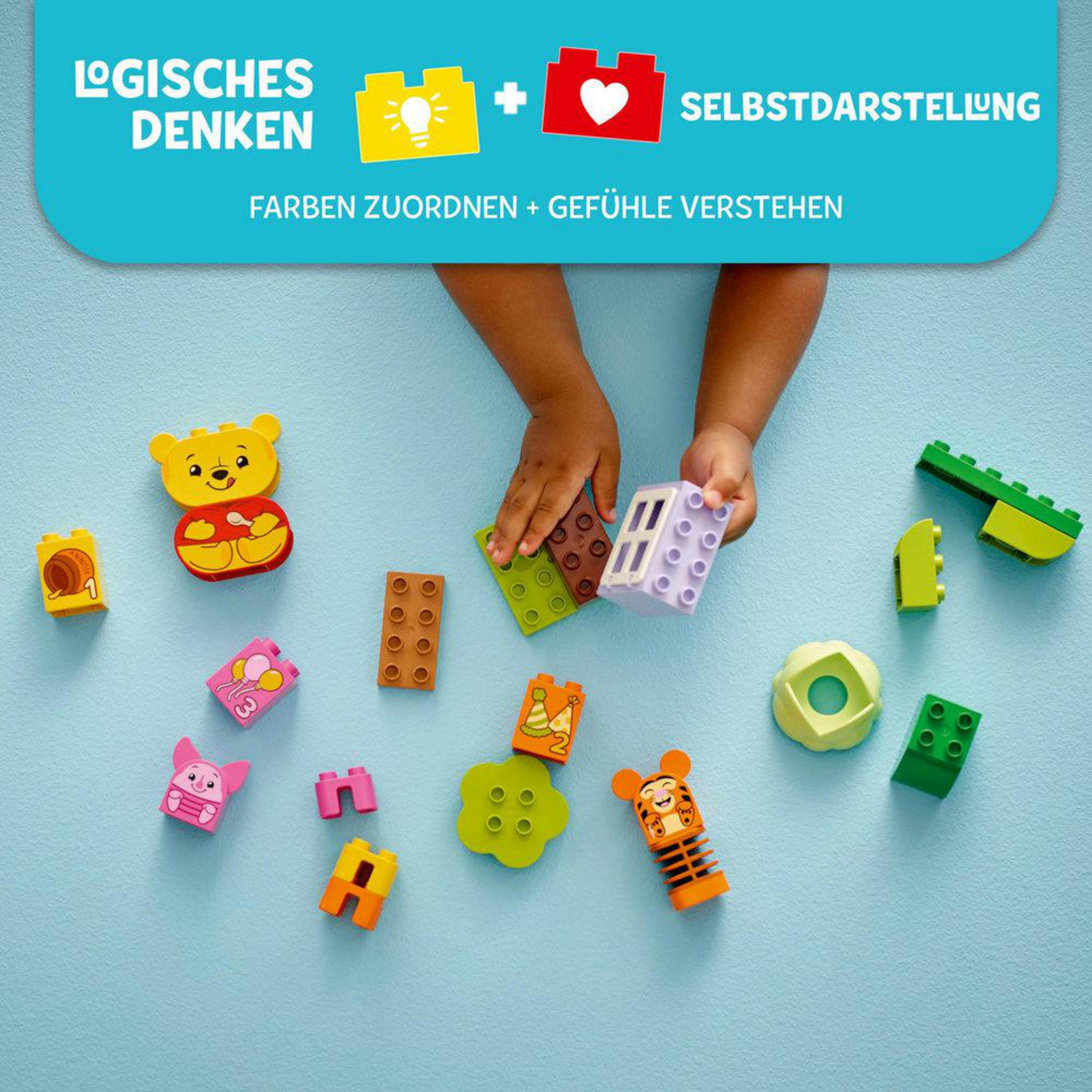 Różne klocki zabawki w różnych kolorach i kształtach. Klocki są na niebieskim tle.