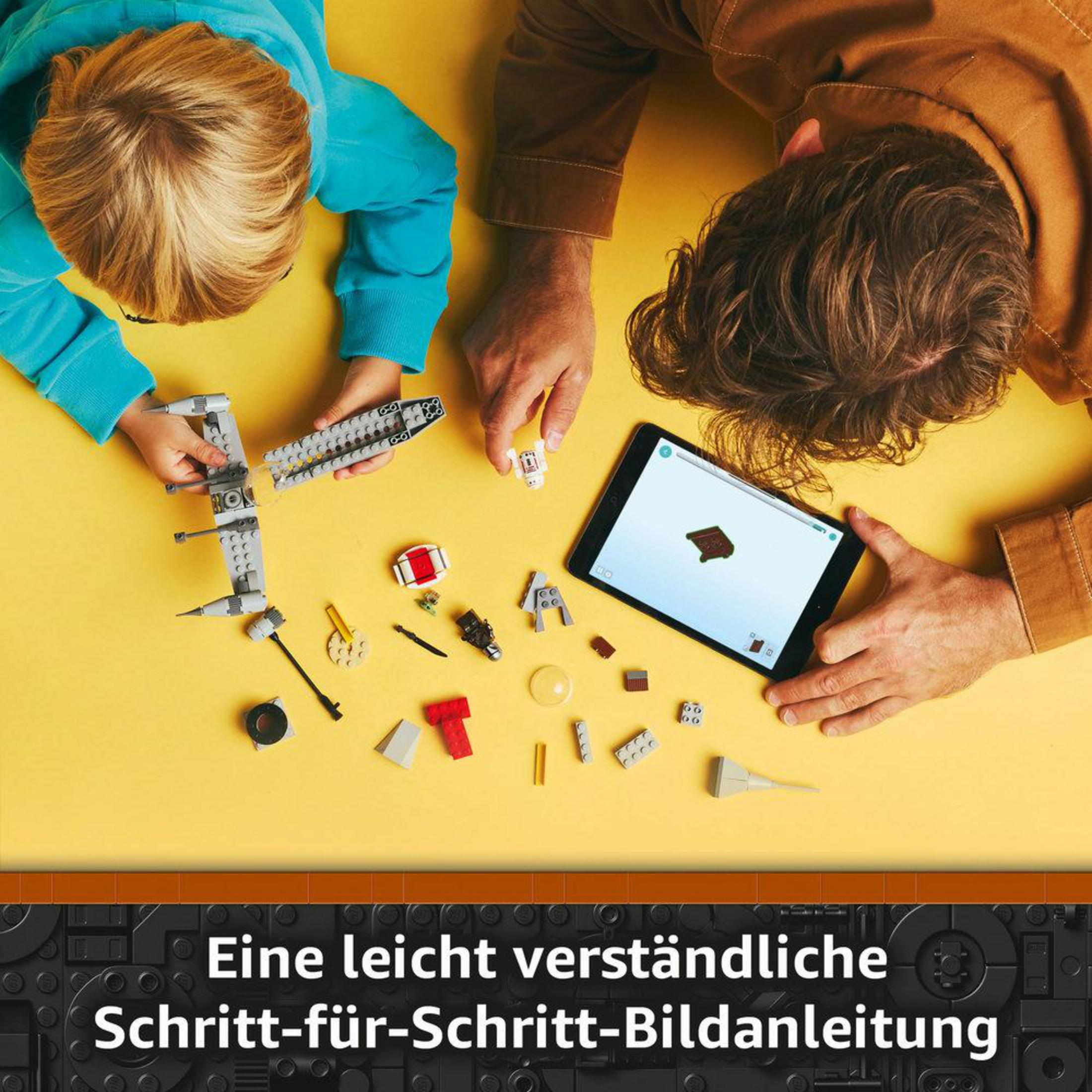 Dos niños construyen con bloques de Lego, usando una tableta para las instrucciones.