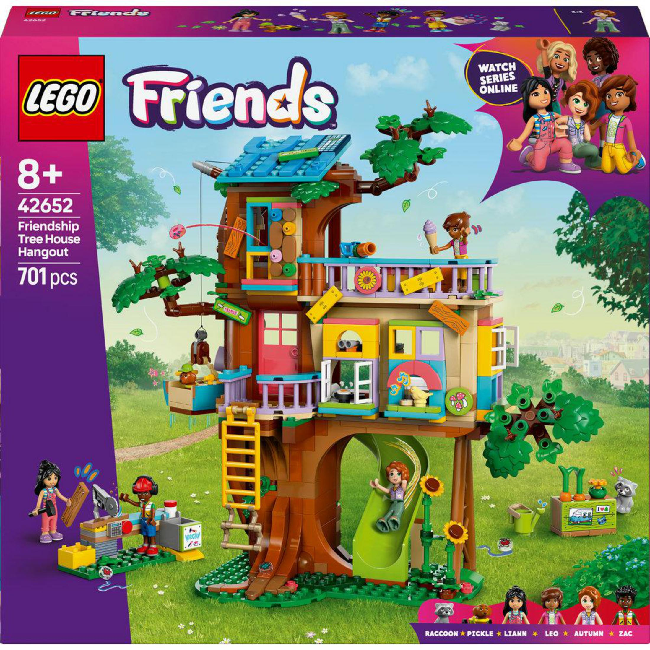 Una caja del set Lego Friends de la casa en el árbol con varias figuras, que muestra la casa en el árbol, el tobogán y los accesorios.