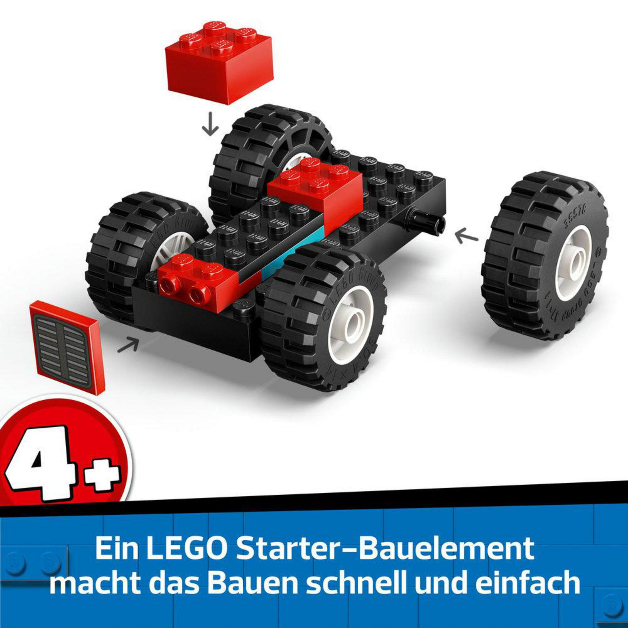 Lego-Auto mit schwarzen Rädern, roten Blöcken und blauem Sockel. Teile sind getrennt.