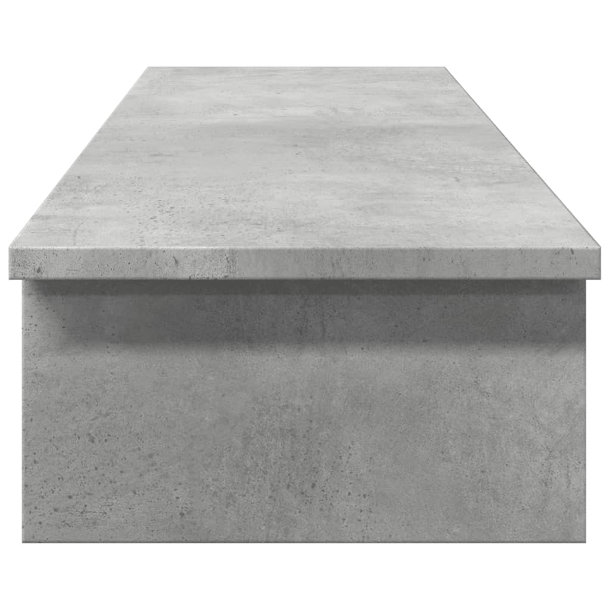 Eine flache, rechteckige Betonfläche mit dunkler grauer Vorderkante, die Oberseite ist ebenfalls grau.