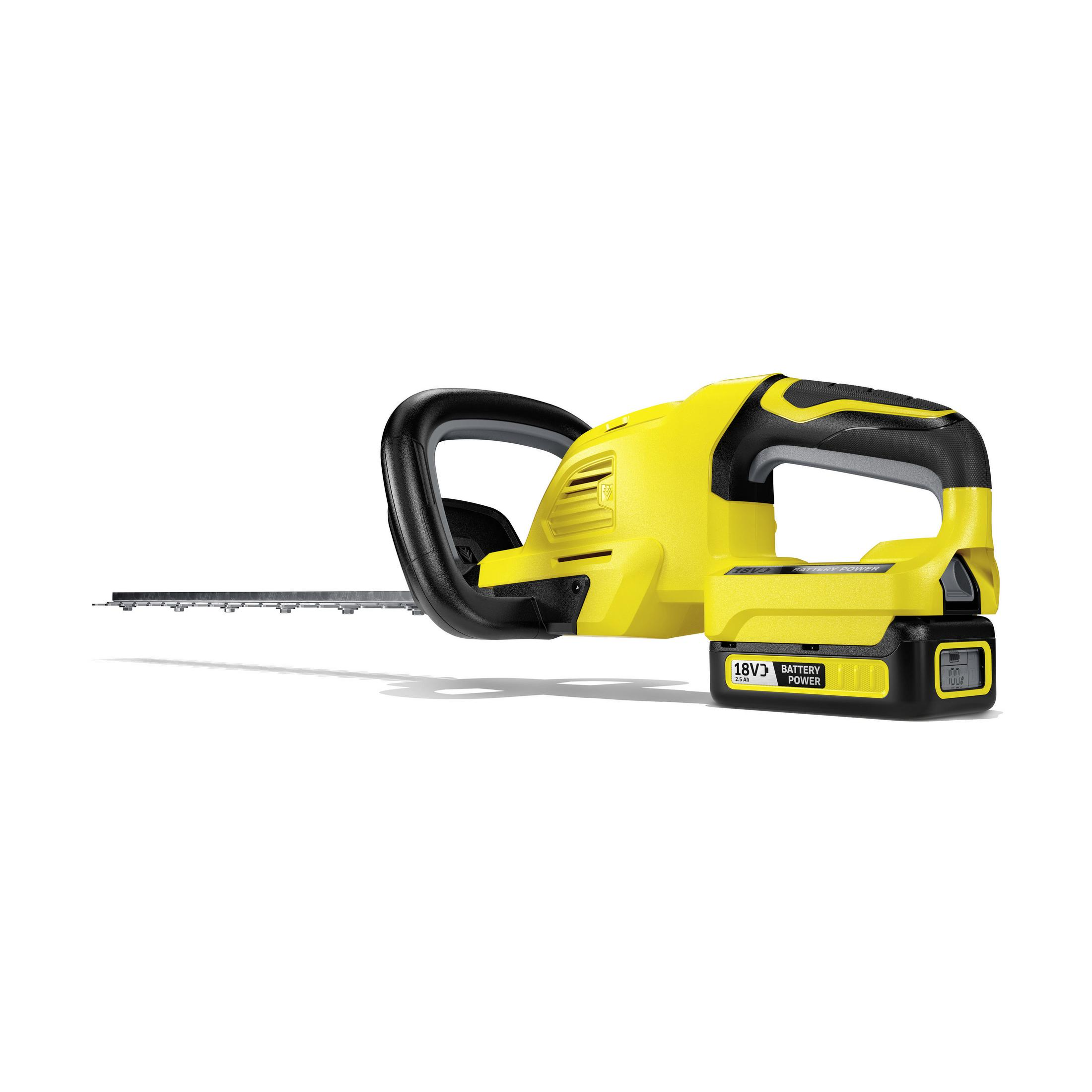 Żółto-czarne nożyce do żywopłotu, widok z boku. Białe tło.