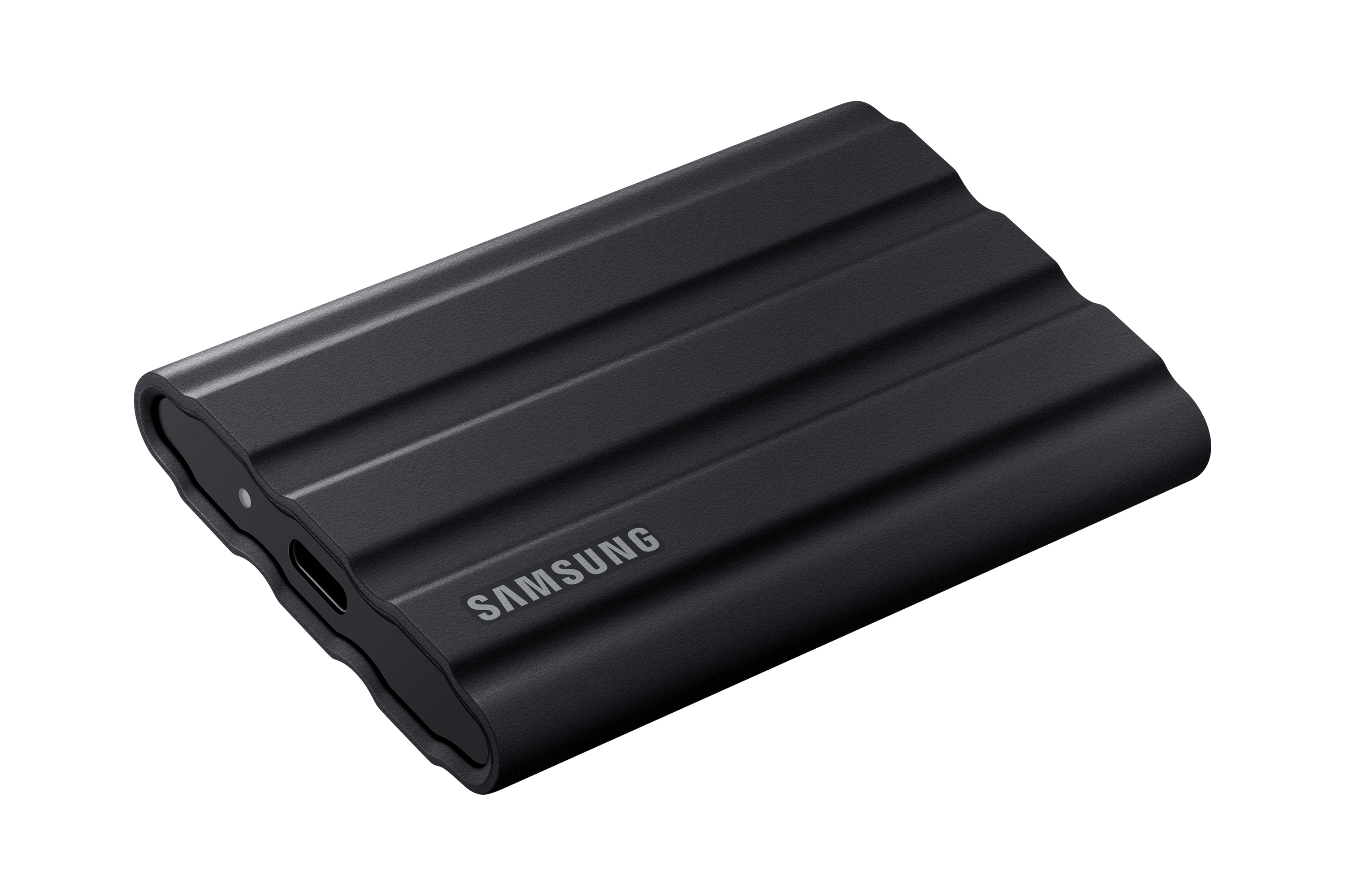 Black Samsung external hard drive. It has a textured surface and the brand name on the front.