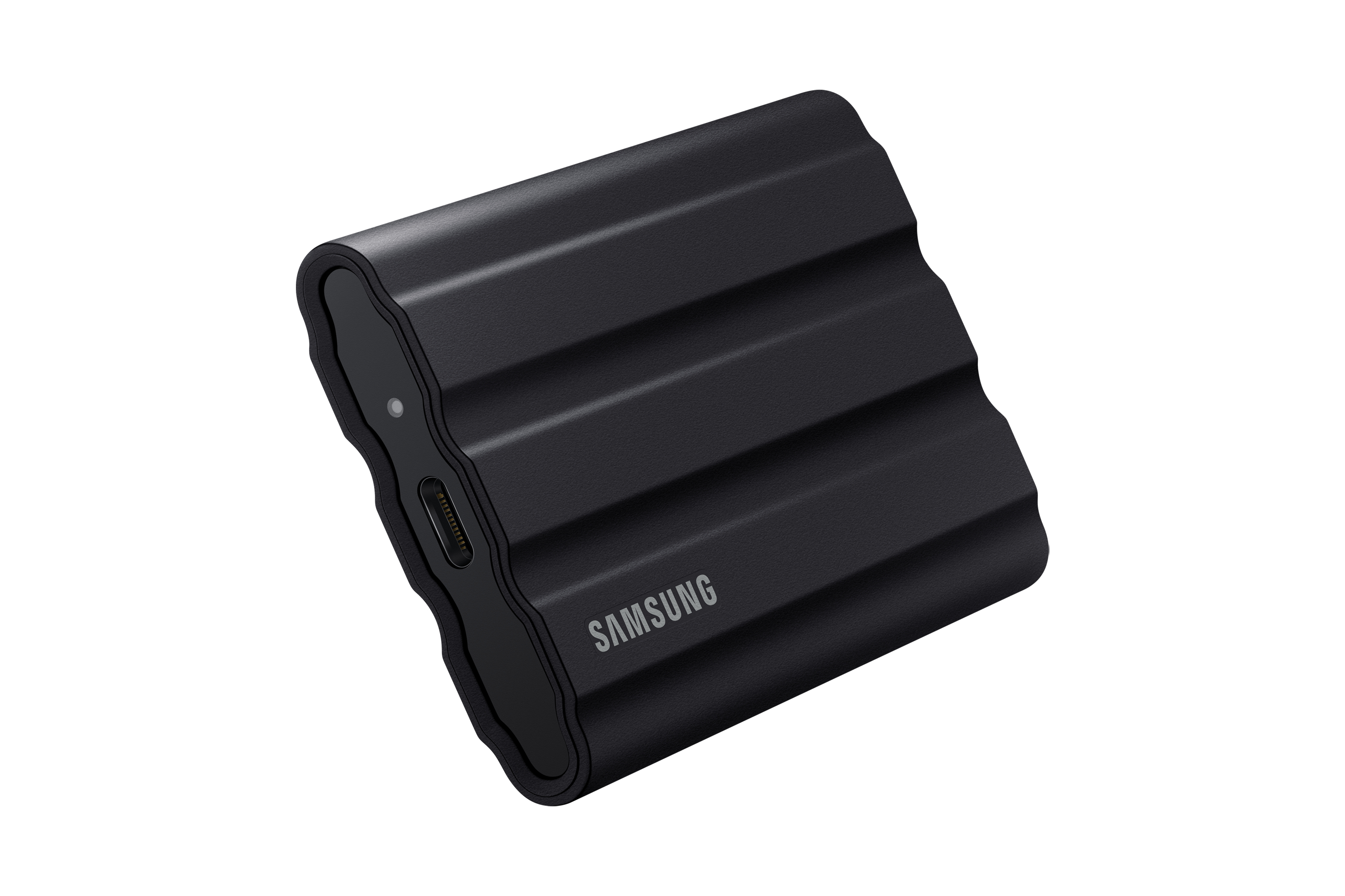 Black Samsung external SSD. It has a ridged design and a USB-C port.