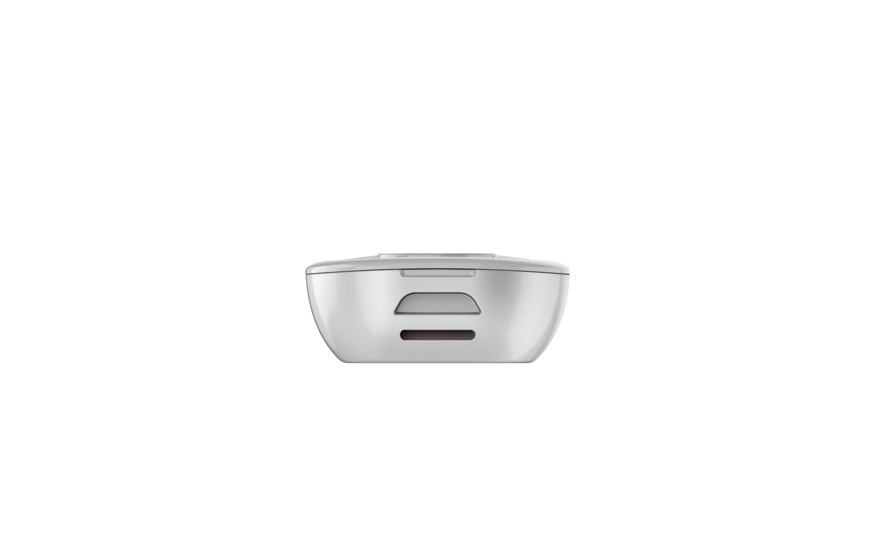 Un dispositivo rectangular blanco, posiblemente un cargador, sobre un fondo blanco.