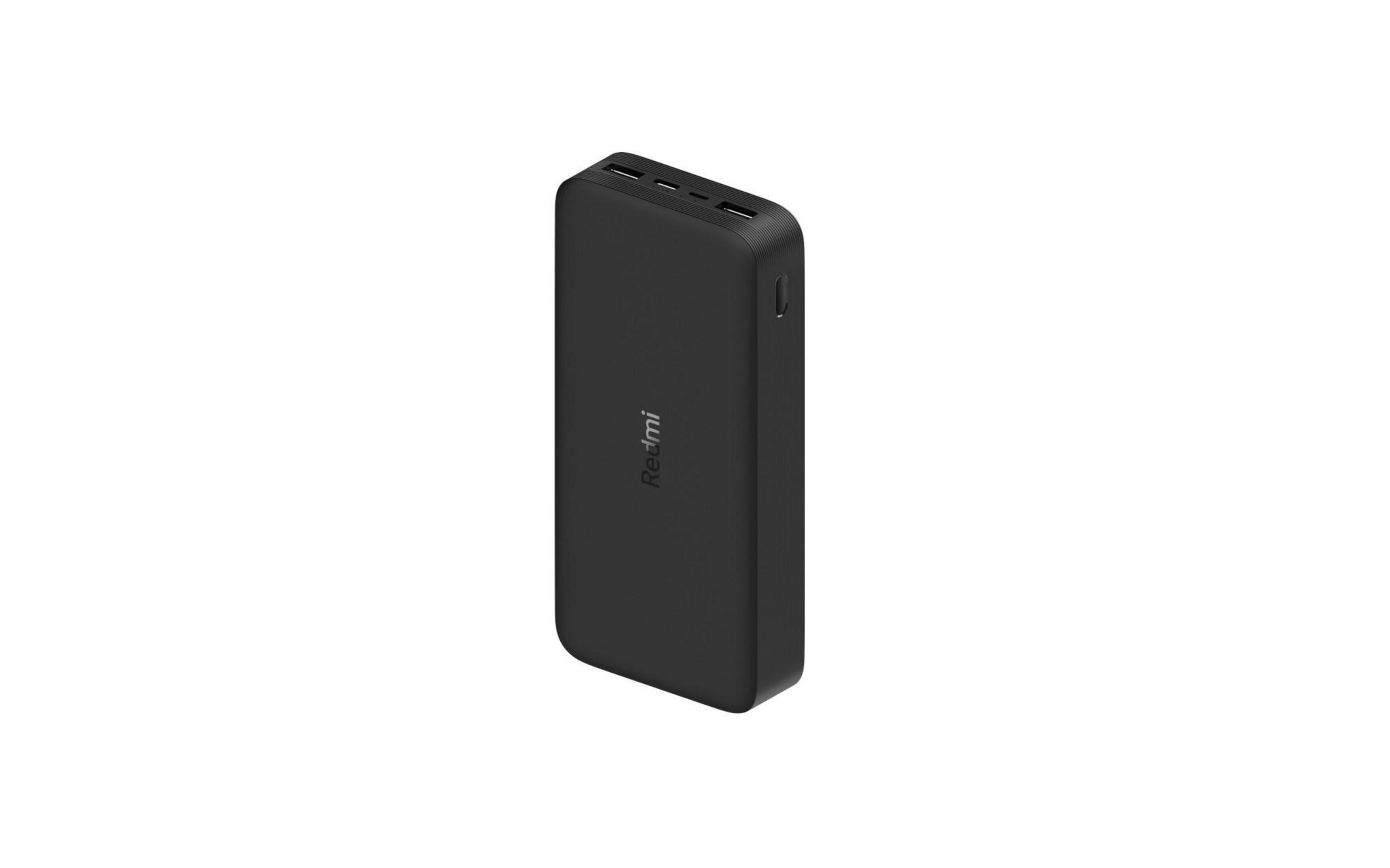 Un banco de energía Redmi negro sobre fondo blanco, vista en ángulo.