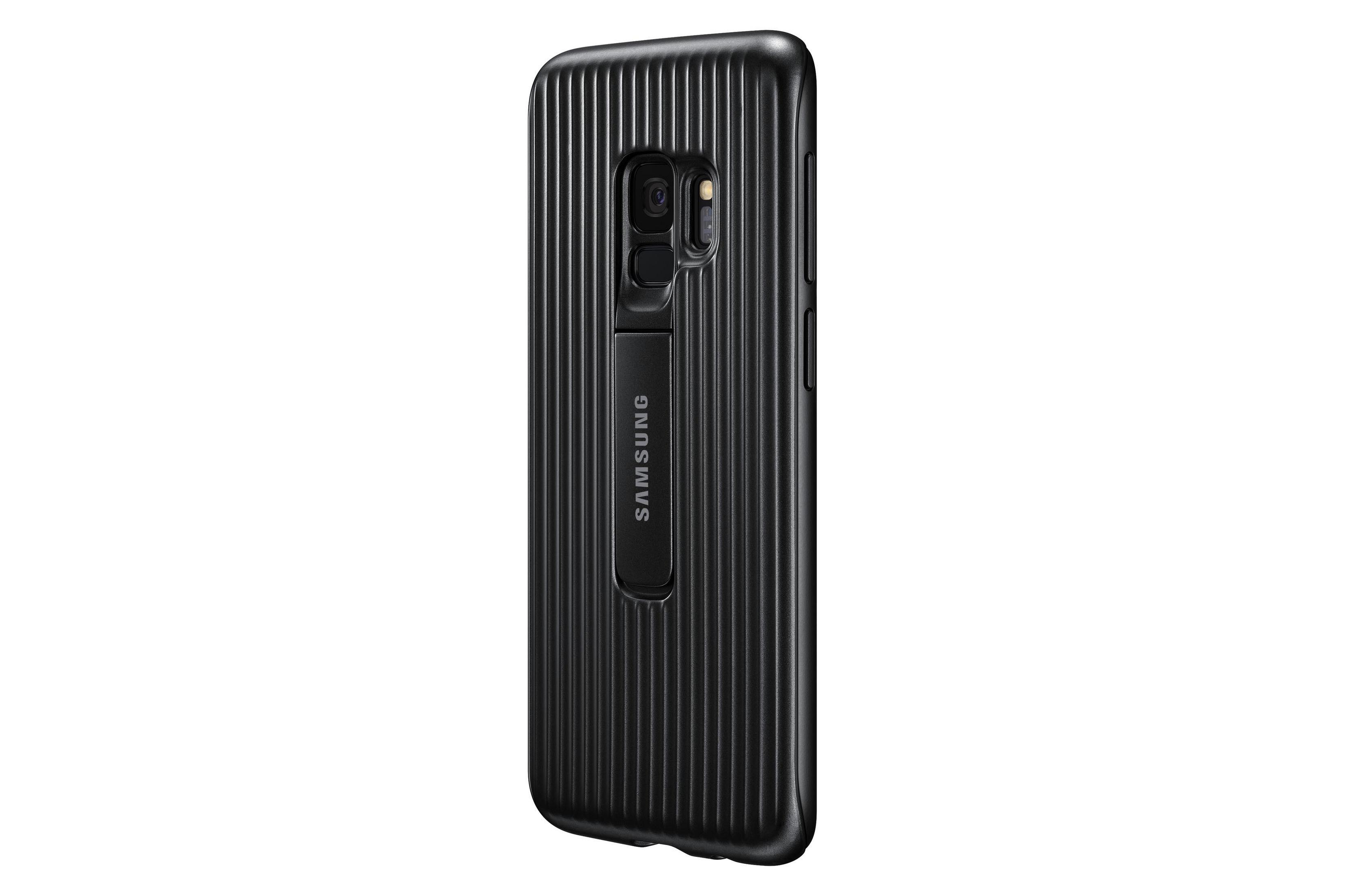 Funda negra para teléfono con soporte, líneas verticales, logotipo Samsung. Fondo blanco.