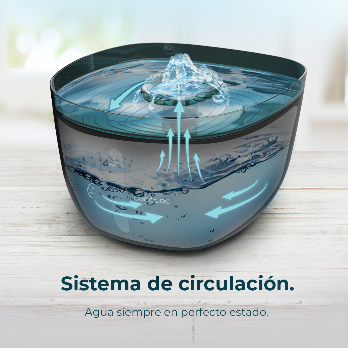 Fuente de agua negra con sistema de circulación de agua. Las flechas muestran el flujo de agua.