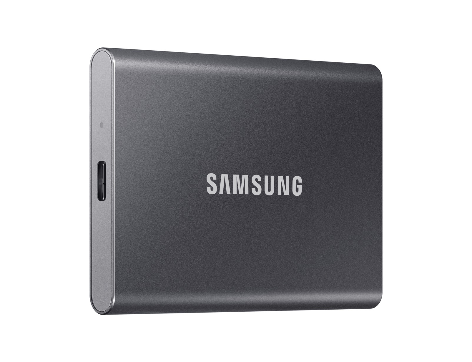 Disco rigido esterno Samsung grigio. Vista laterale con porta, sfondo bianco.