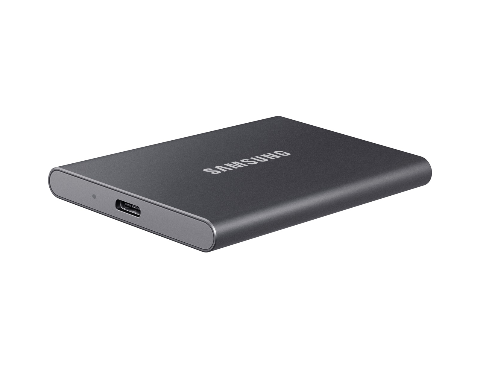 Disco rigido esterno Samsung grigio scuro su sfondo bianco.