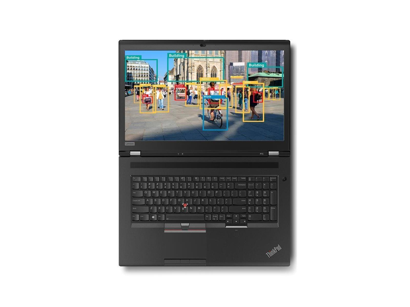 Laptop-Bildschirm zeigt eine Stadtszene mit Begrenzungsrahmen, die Objekterkennungsanalyse anzeigen.