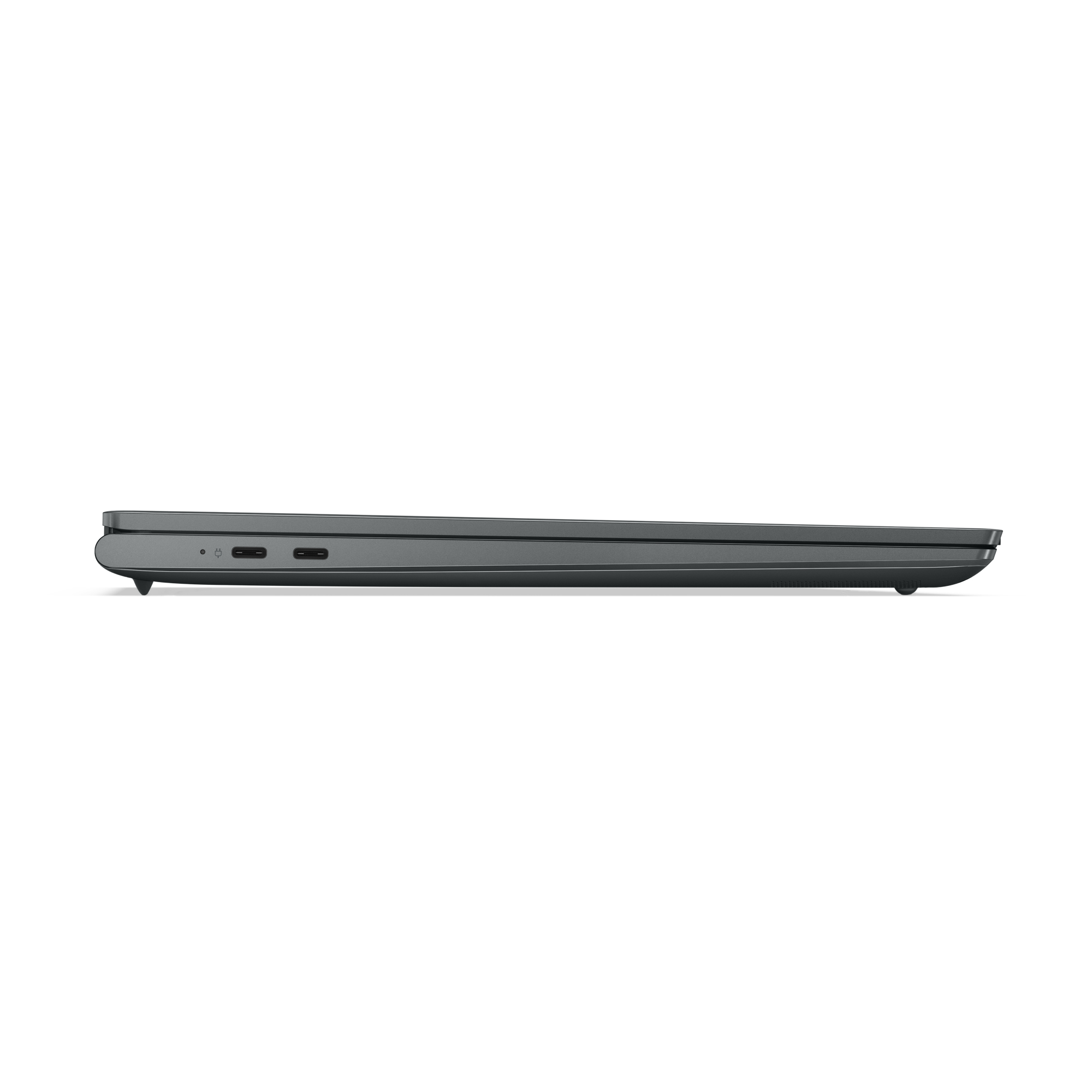 Una laptop gris oscuro cerrada, vista de lado.