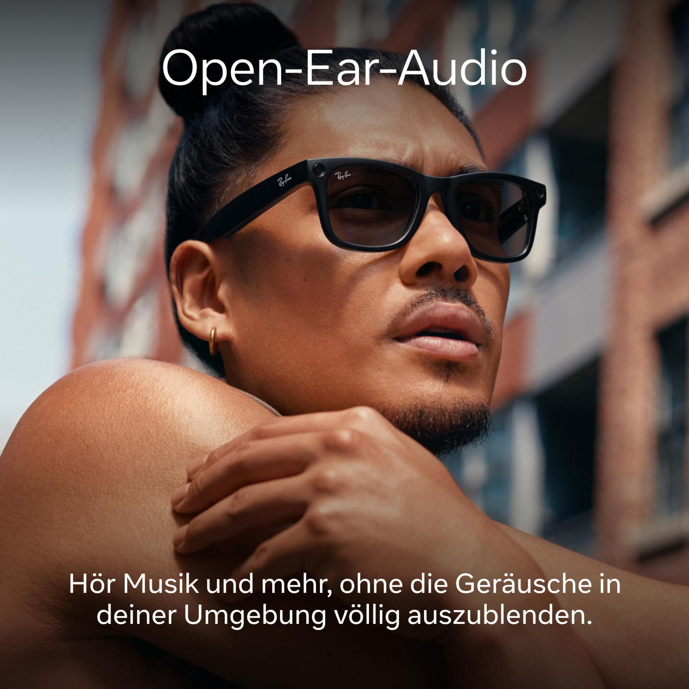 Un hombre con gafas de sol, la imagen tiene texto: Open-Ear-Audio y texto en alemán.
