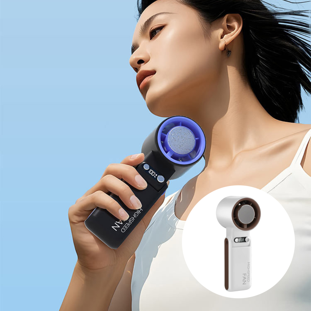 Eine Frau hält einen schwarzen tragbaren Ventilator. Es hat einen blauen Ventilator.