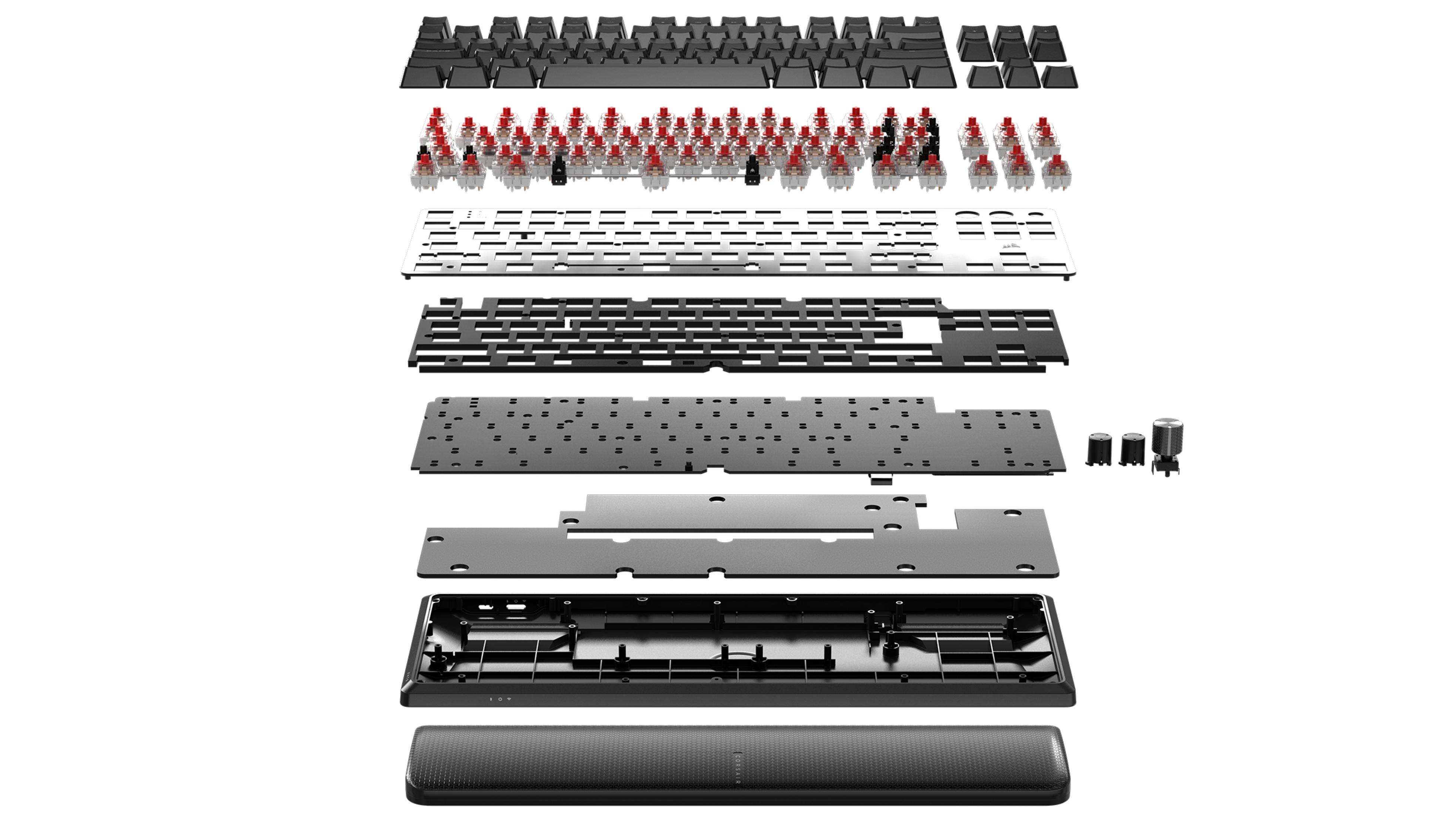 Widok rozłożony klawiatury, pokazujący wszystkie jej elementy na białym tle.