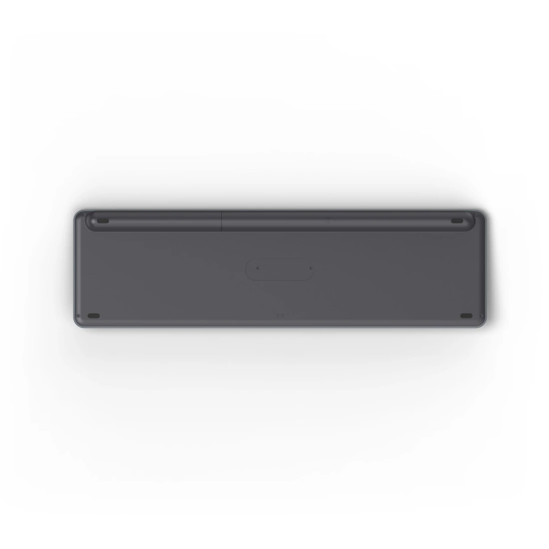 Teclado gris, vista inferior. El teclado es plano y las teclas no son visibles.