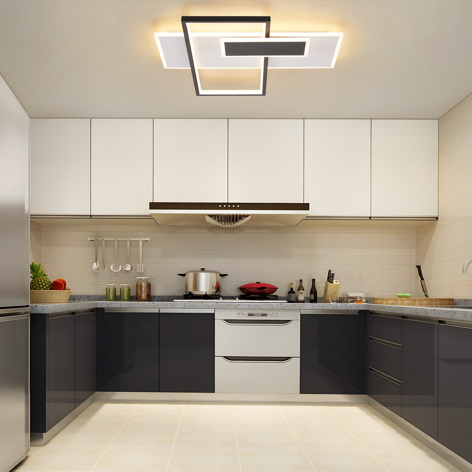 Una cucina moderna con mobili bianchi e grigi, un frigorifero e una luce a soffitto.
