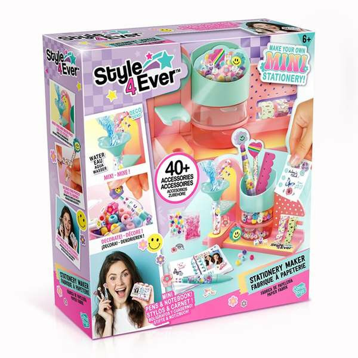 Caja con un kit de fabricante de papelería colorido. Fondo blanco.