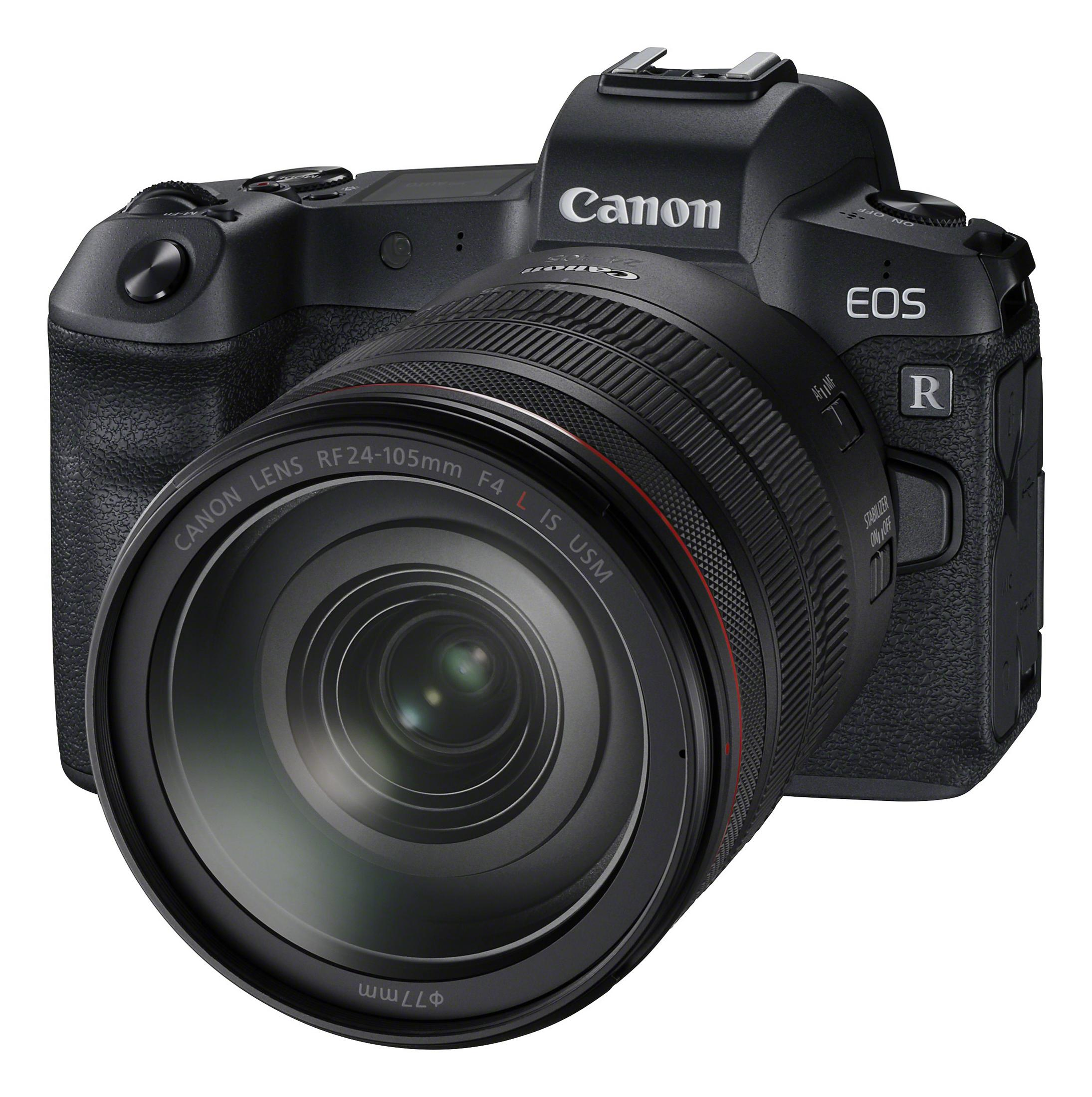 Fotocamera Canon nera con obiettivo, isolata su sfondo bianco.