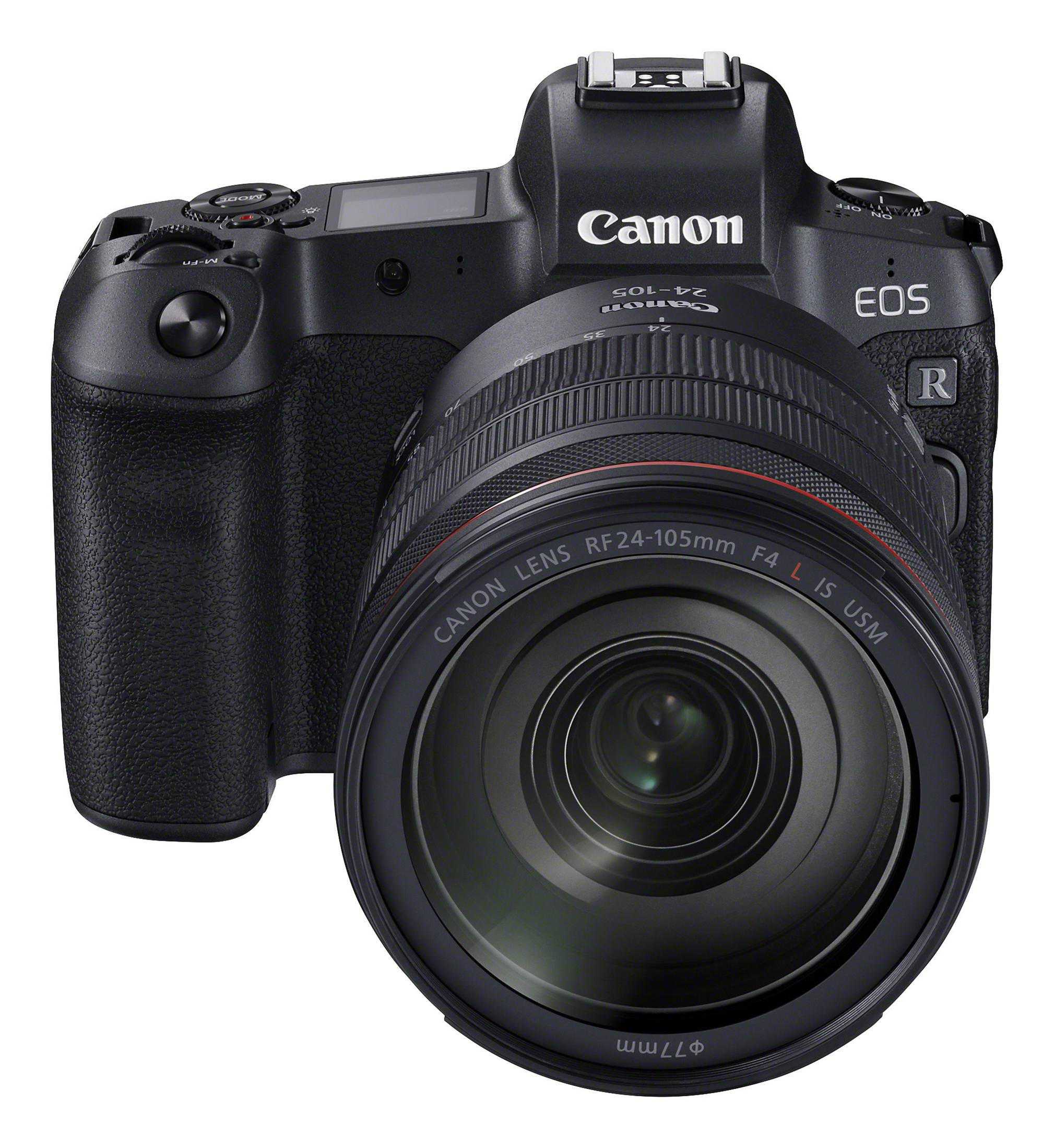 Fotocamera Canon con obiettivo, isolata su sfondo bianco.