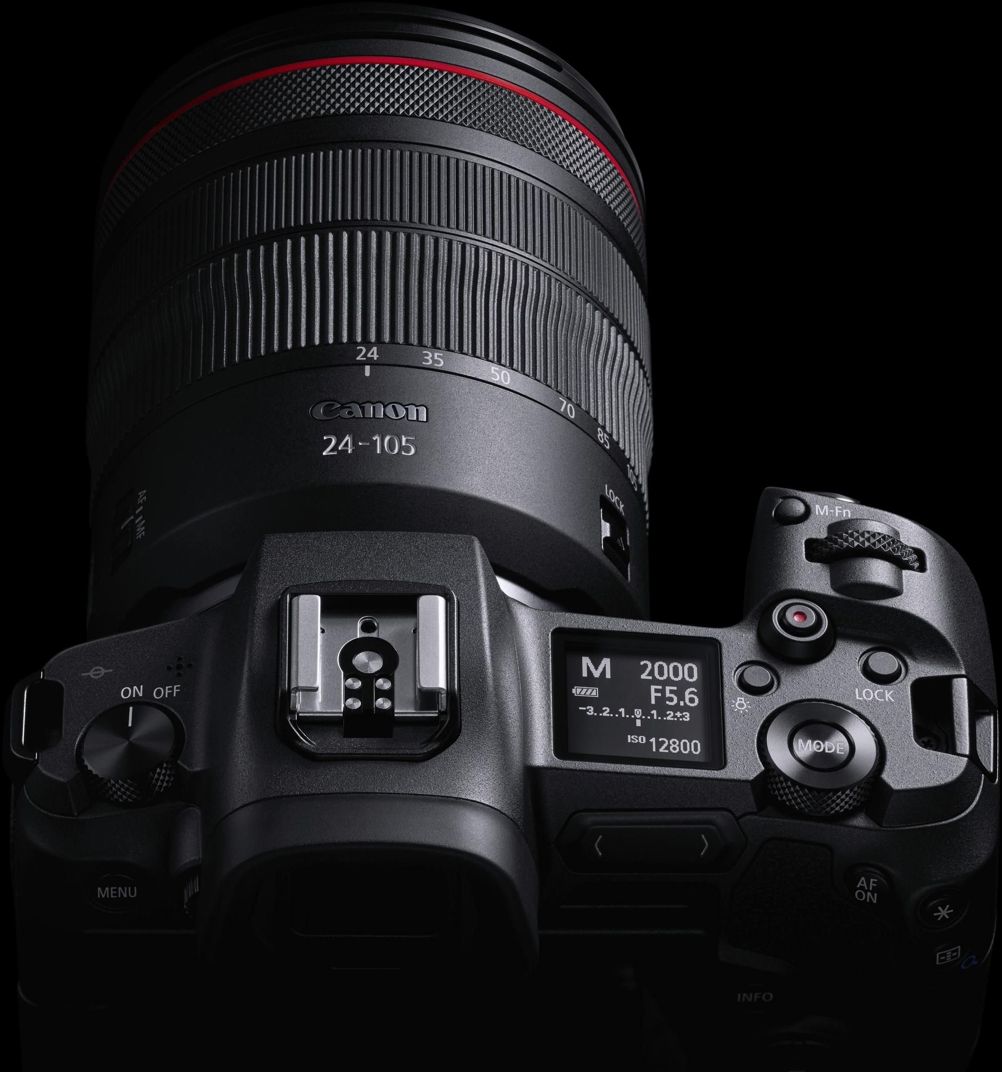 Fotocamera Canon con obiettivo, che mostra le impostazioni sul display. Corpo nero con pulsante rosso.