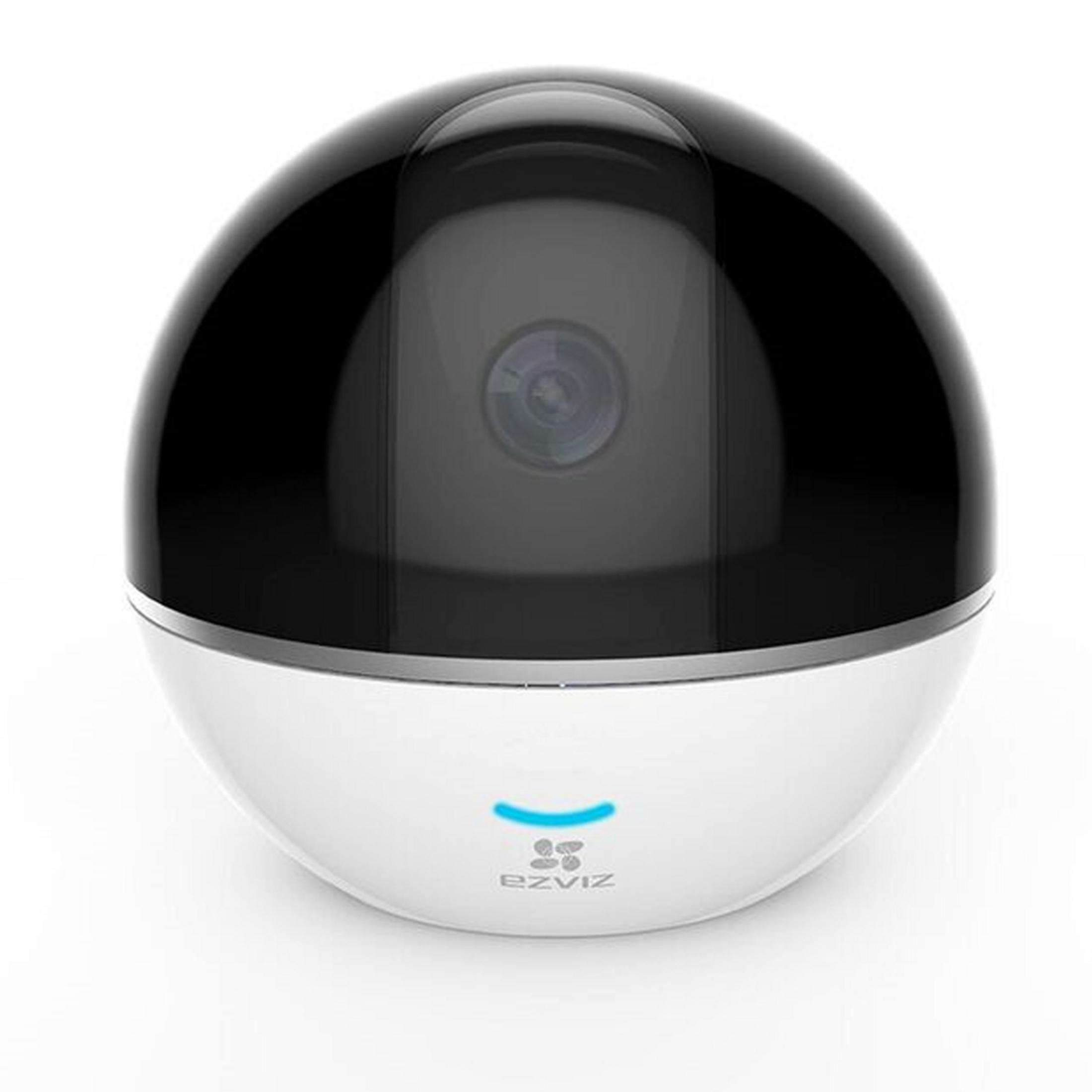 Telecamera di sorveglianza bianca e nera, design arrotondato, luce blu.
