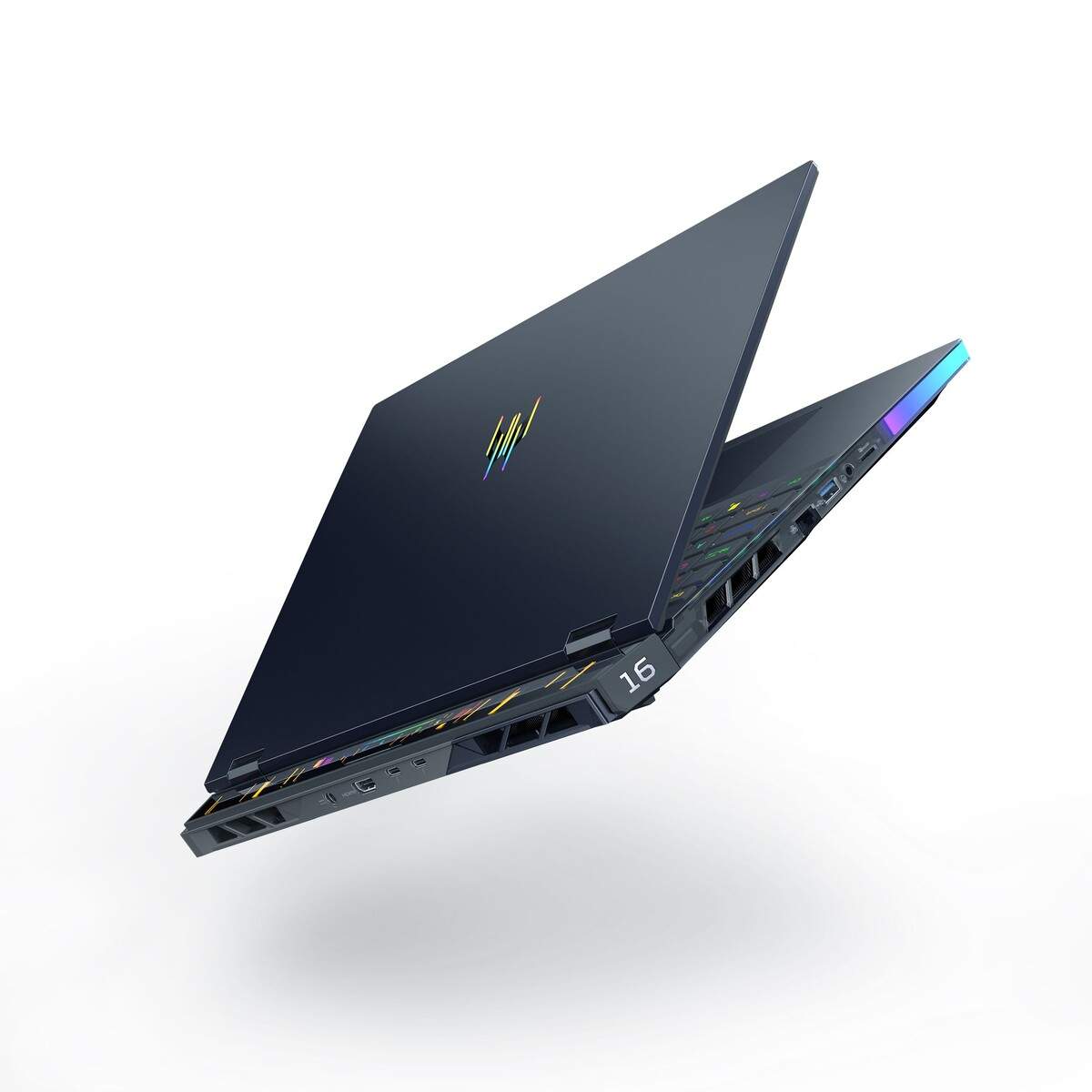 A dark gray laptop. The screen is open and displays a colorful logo.