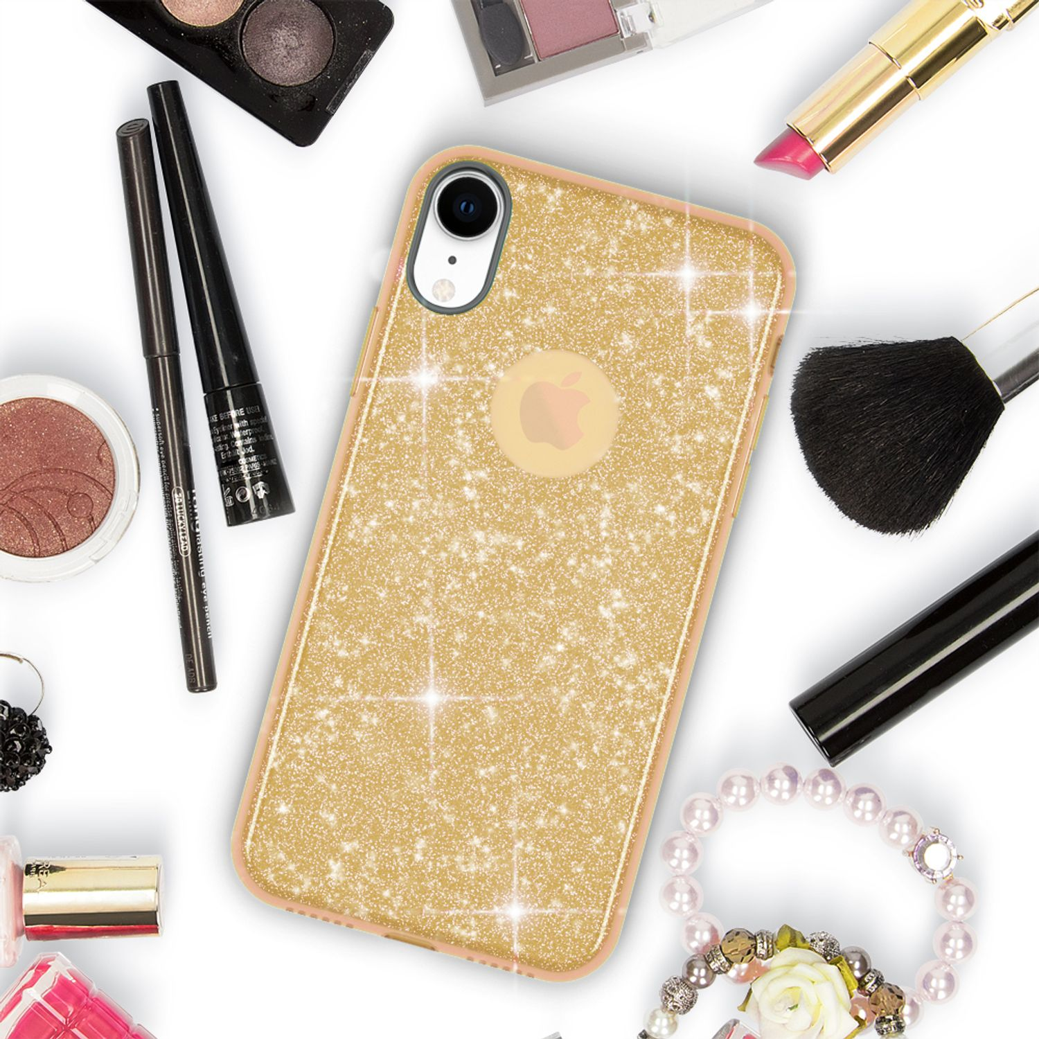 Custodia dorata scintillante con trucco. Custodia con logo Apple, circondata da trucco.