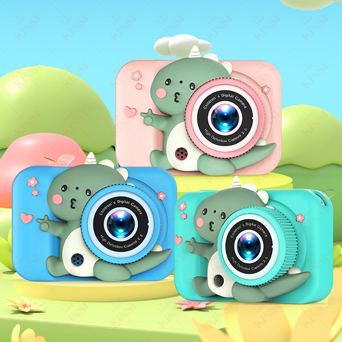 Trzy kolorowe aparaty zabawki. Każdy ma kreskówkowego dinozaura z przodu.