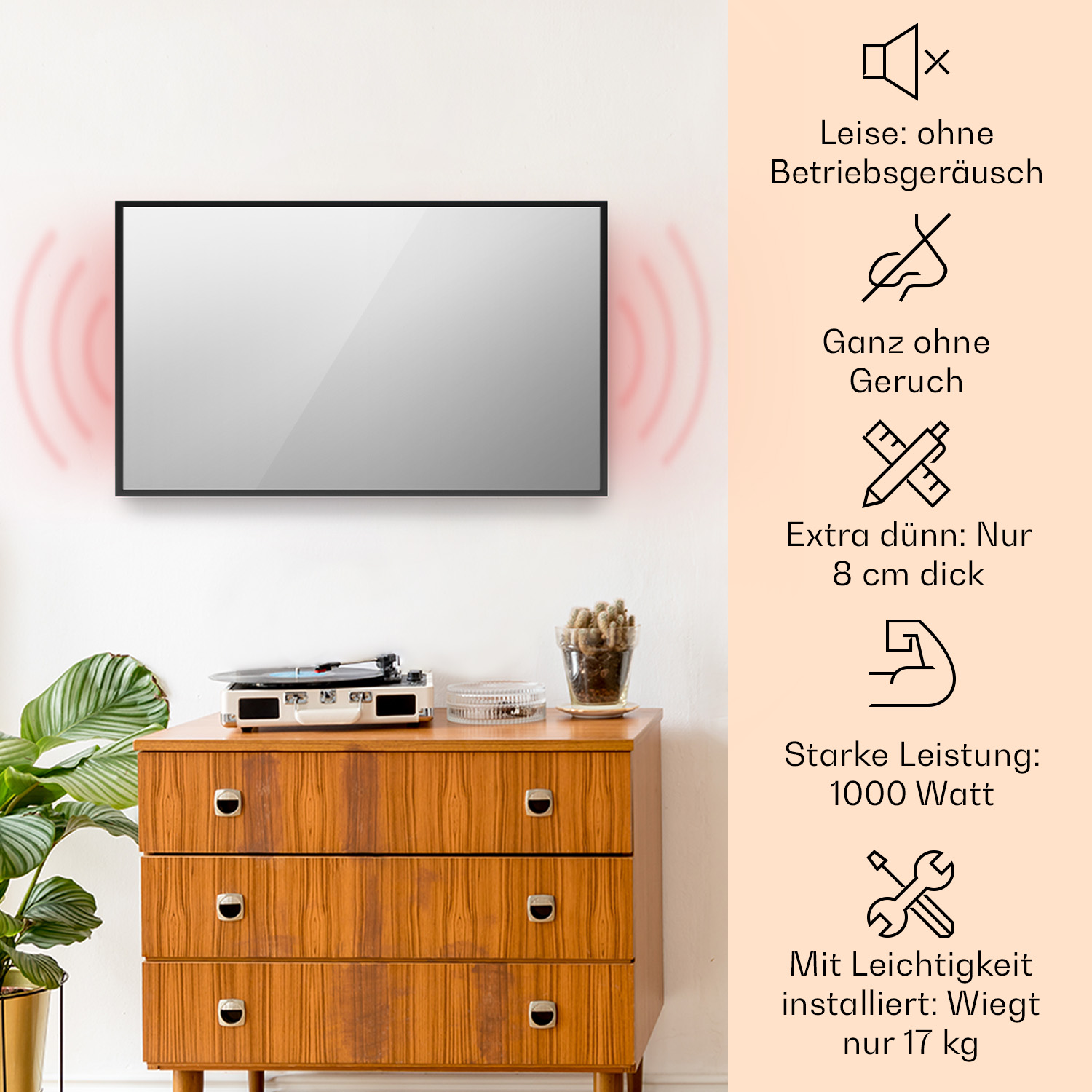 Eine Wand-TV über einer Holzkommode, mit Text zu Funktionen: kein Lärm, kein Geruch, dünn, starke Leistung.