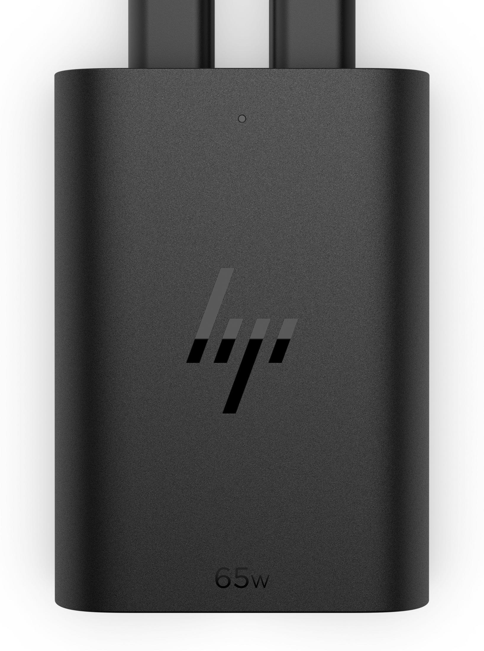 Schwarzes 65-W-HP-Netzteil mit zwei angeschlossenen Kabeln.