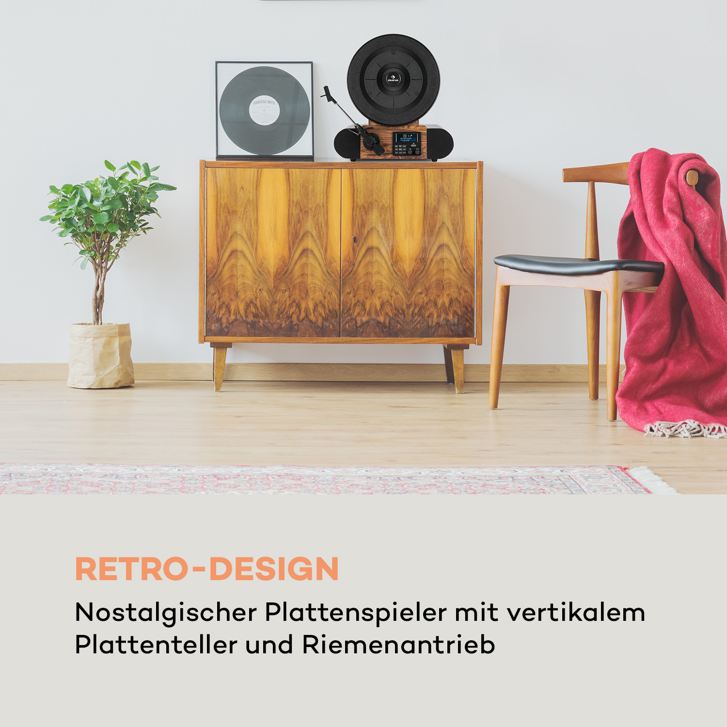 Retro-Design-Plattenspieler mit vertikalem Plattenteller und roter Decke.