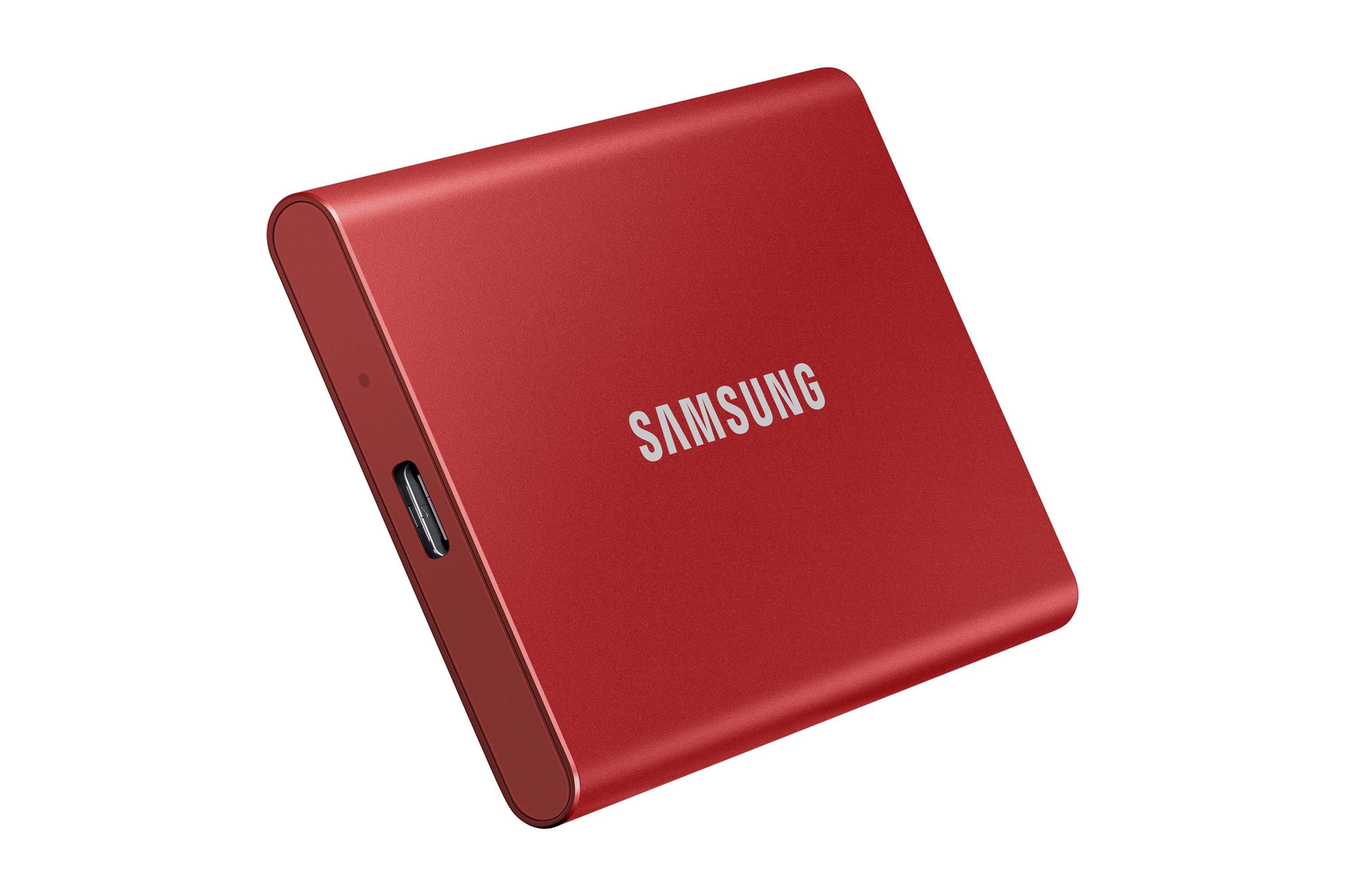Rote tragbare SSD, Marke SAMSUNG, isoliert vor weißem Hintergrund.