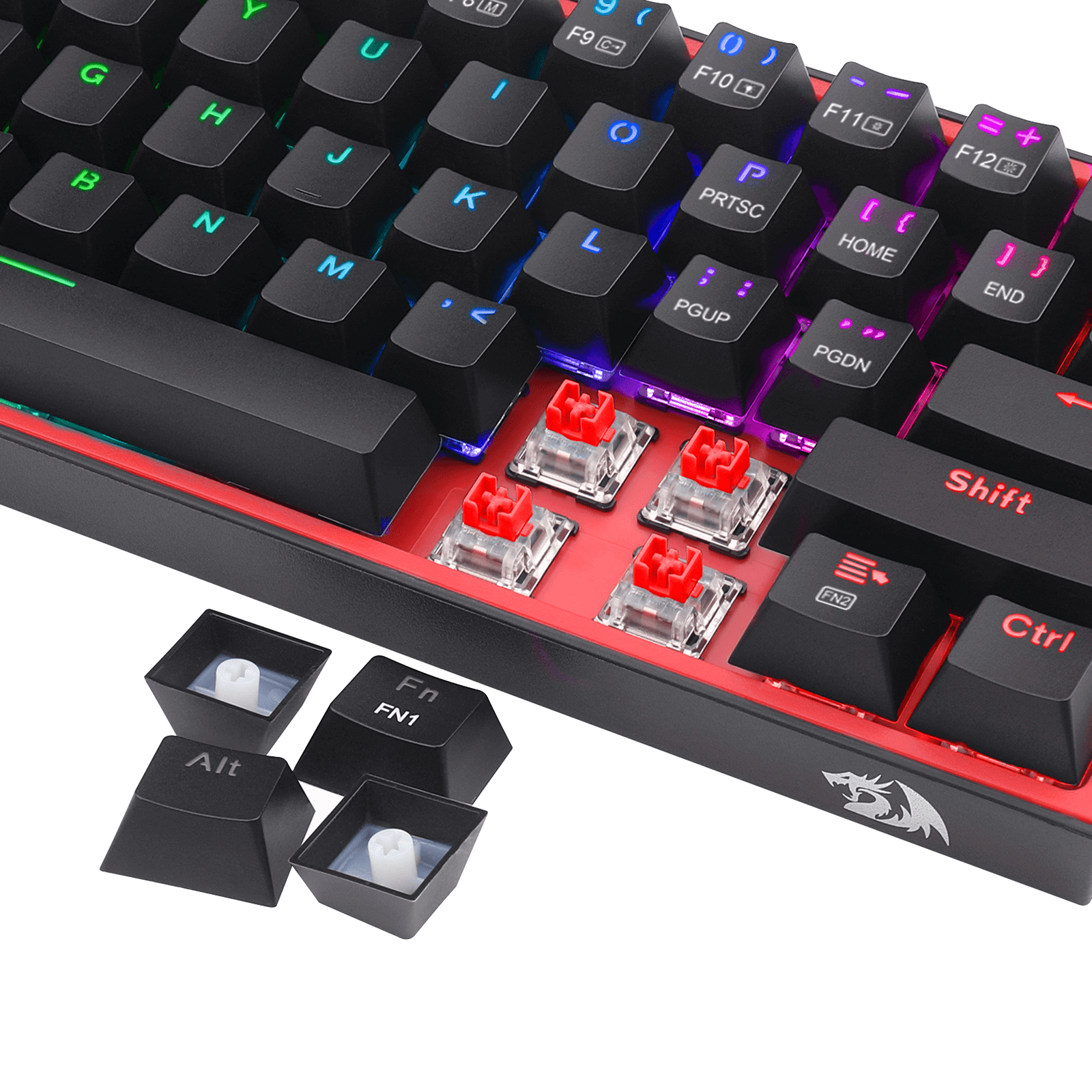 Nahaufnahme einer Tastatur. Schwarze Tasten entfernt, rote Schalter freigelegt. Weißer Hintergrund.