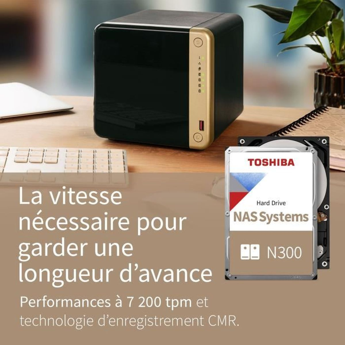 Toshiba NAS with other devices on a desk, hard drive in front.