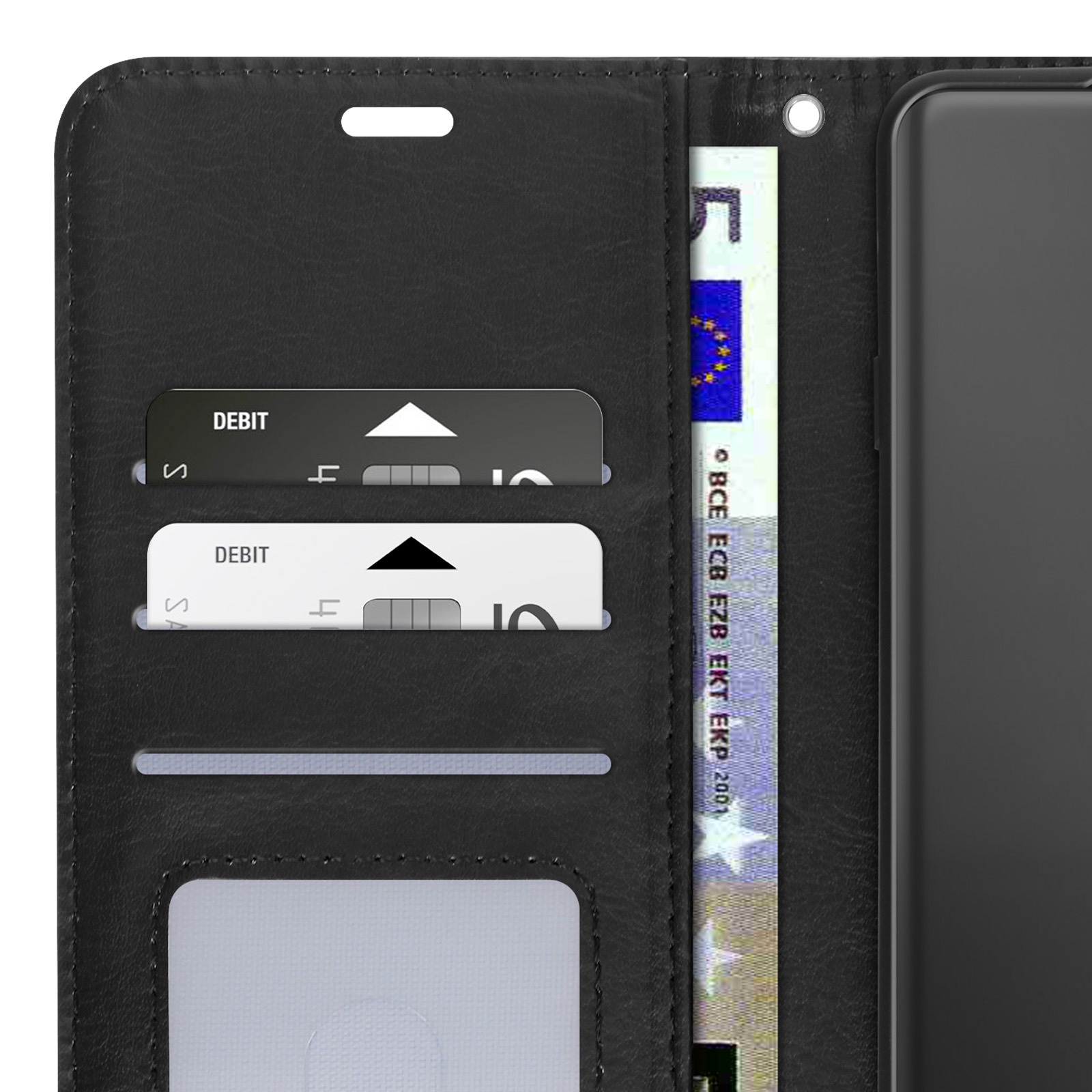 Primo piano dell'interno di una custodia nera con carte e denaro.