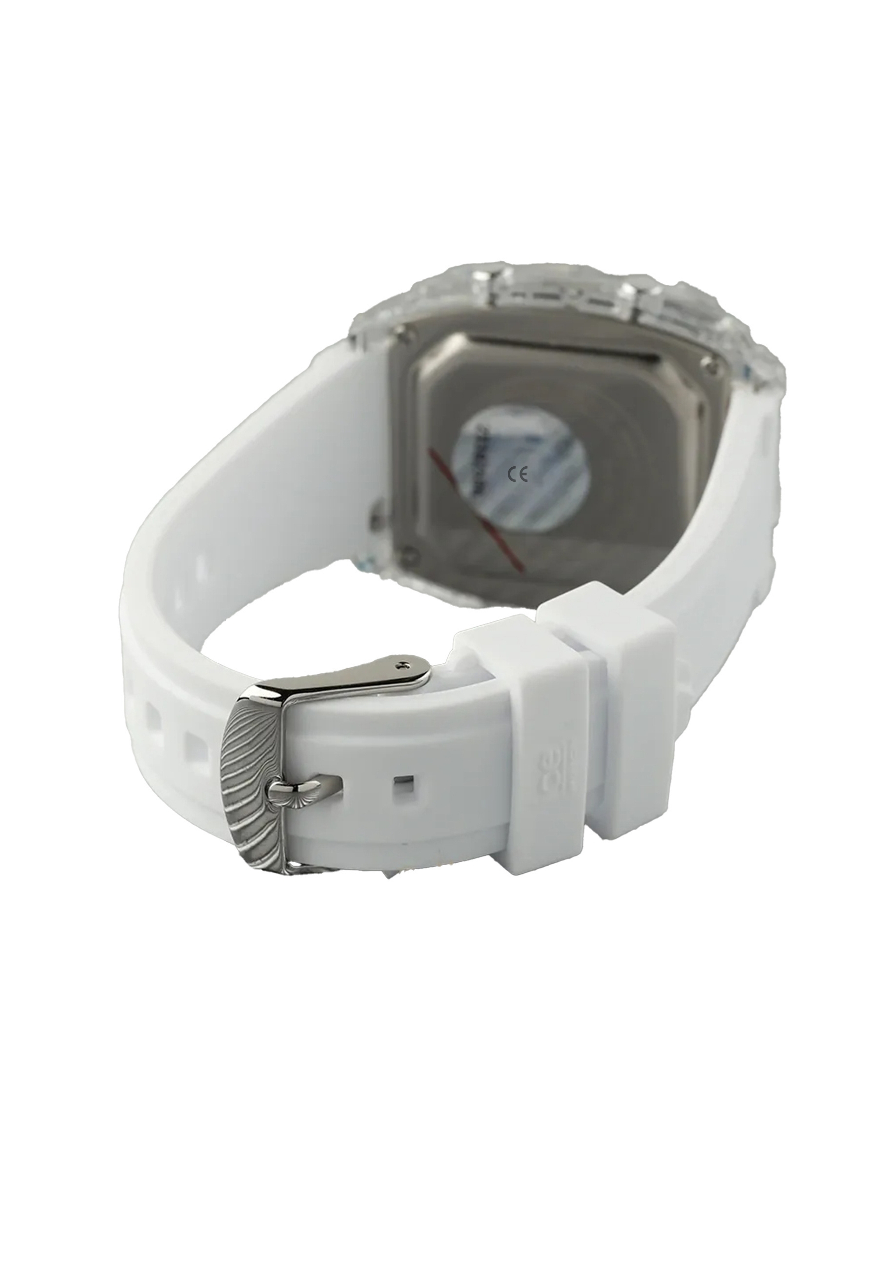 Weiße Uhr mit quadratischem Zifferblatt und weißem Armband. Die Uhr wird von hinten betrachtet.