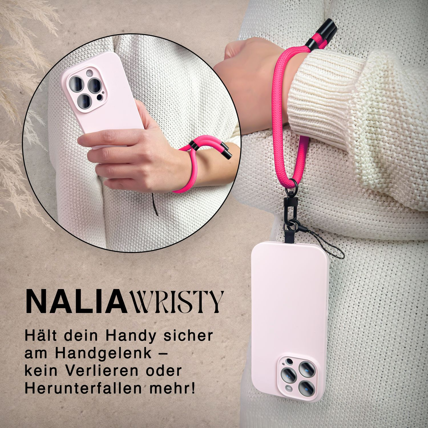 Eine Person trägt eine rosa Handgelenksschlaufe; ein rosa Telefon ist an der Schlaufe befestigt.