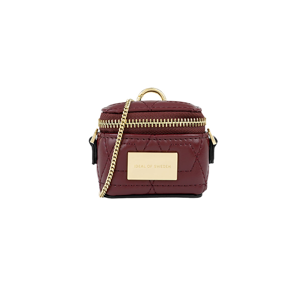 Pequeño bolso cuadrado burdeos con cadena y cremallera doradas, dice Ideal of Sweden.