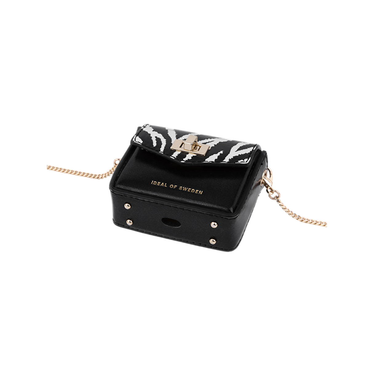 Funda AirPod negra con diseño de cebra, cadena dorada, marca Ideal of Sweden.