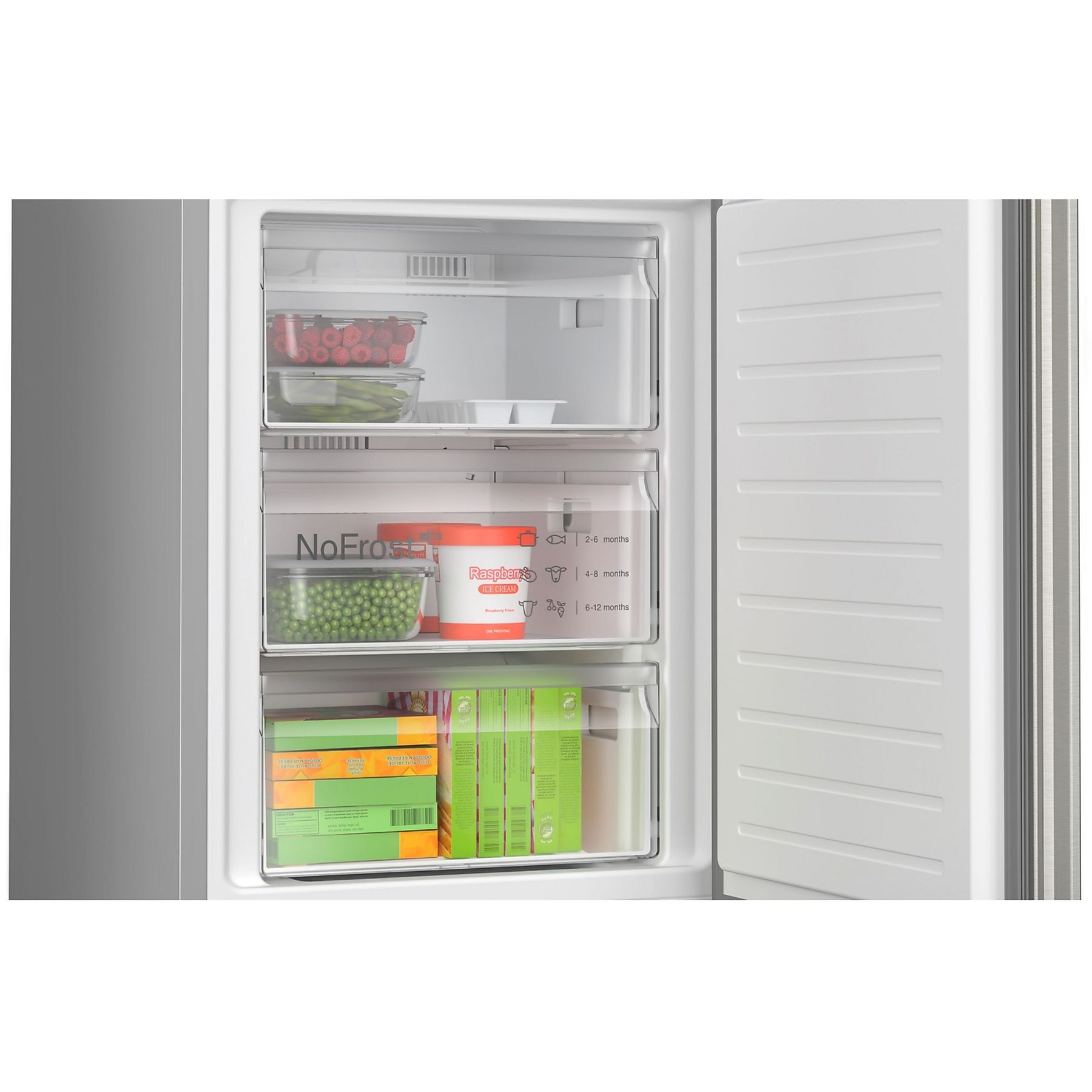 In einem Kühlschrank: Schubladen mit Lebensmitteln, darunter Himbeeren, Erbsen und Spargel.