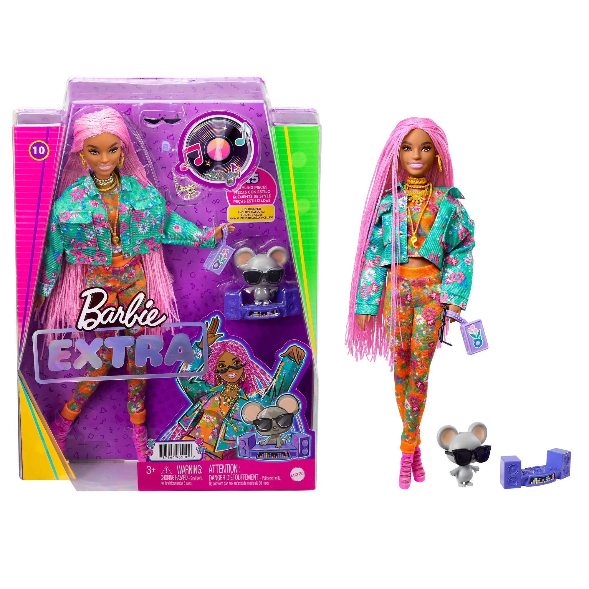 Eine Barbie Extra Puppe in einer Box und separat, mit rosa Haaren, in farbenfrohen Kleidern.