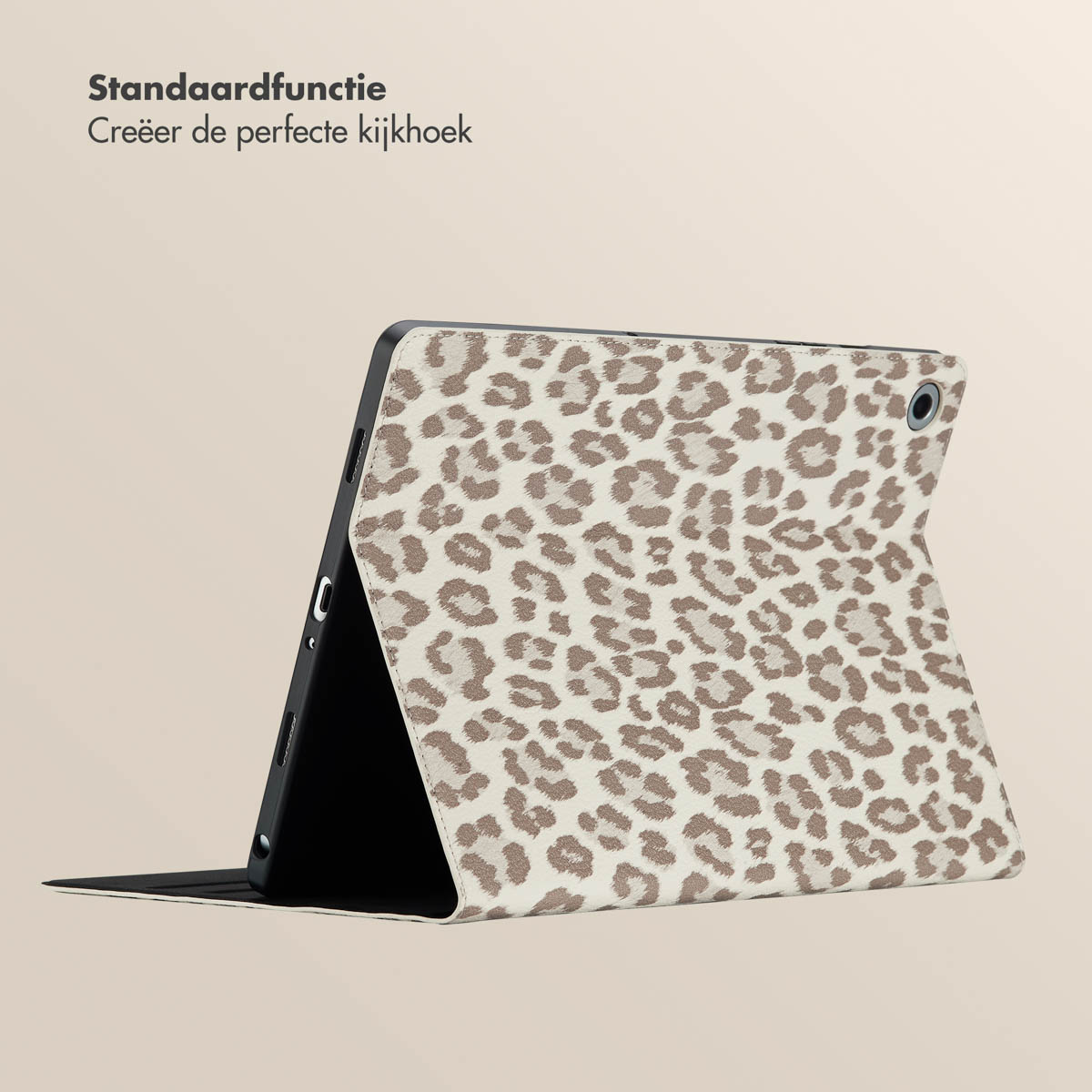 Tablet with leopard print cover. The cover is open, showing the screen and a beige background.