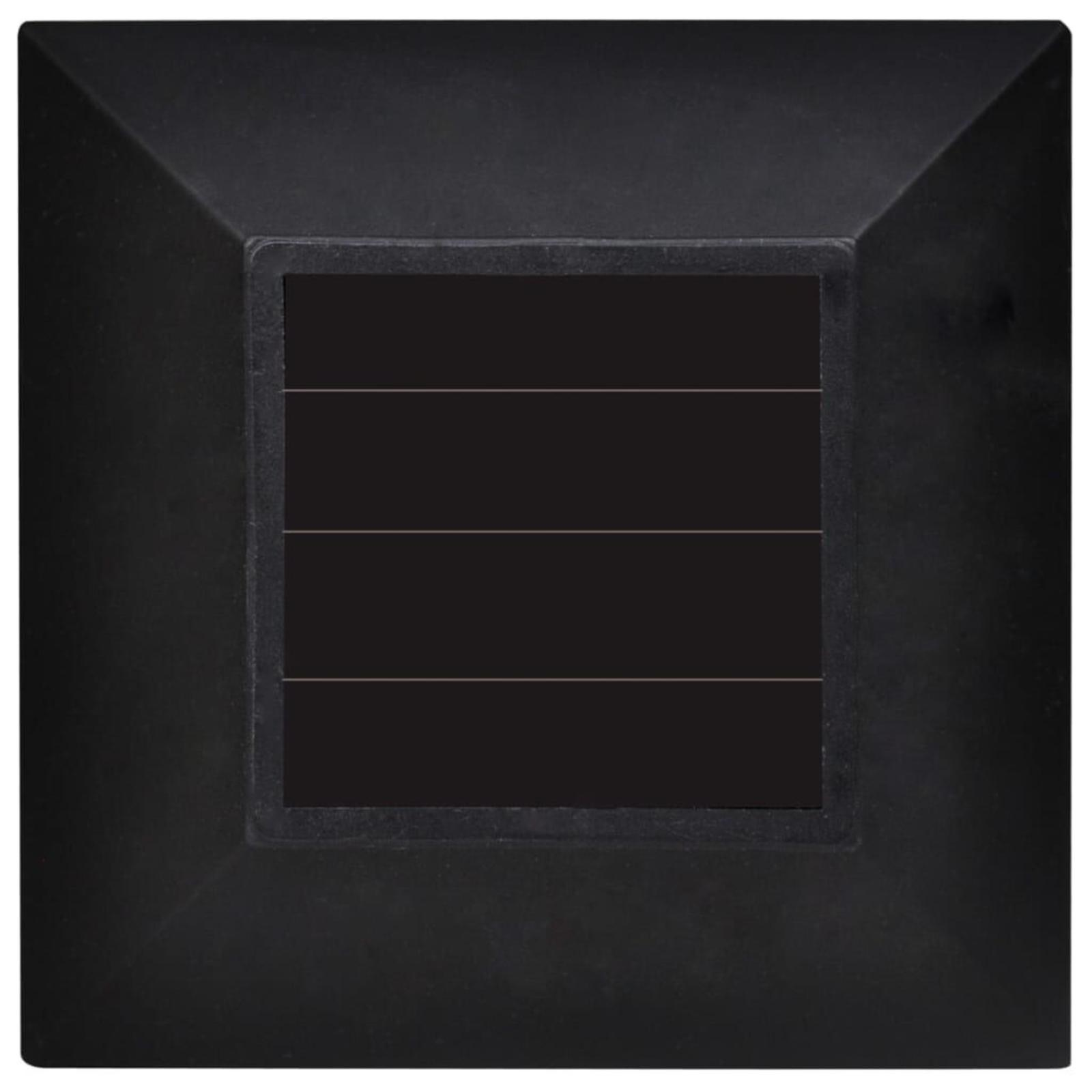 Schwarzes Quadrat mit vier schwarzen Rechtecken. Die Oberfläche hat ein strukturiertes Aussehen.