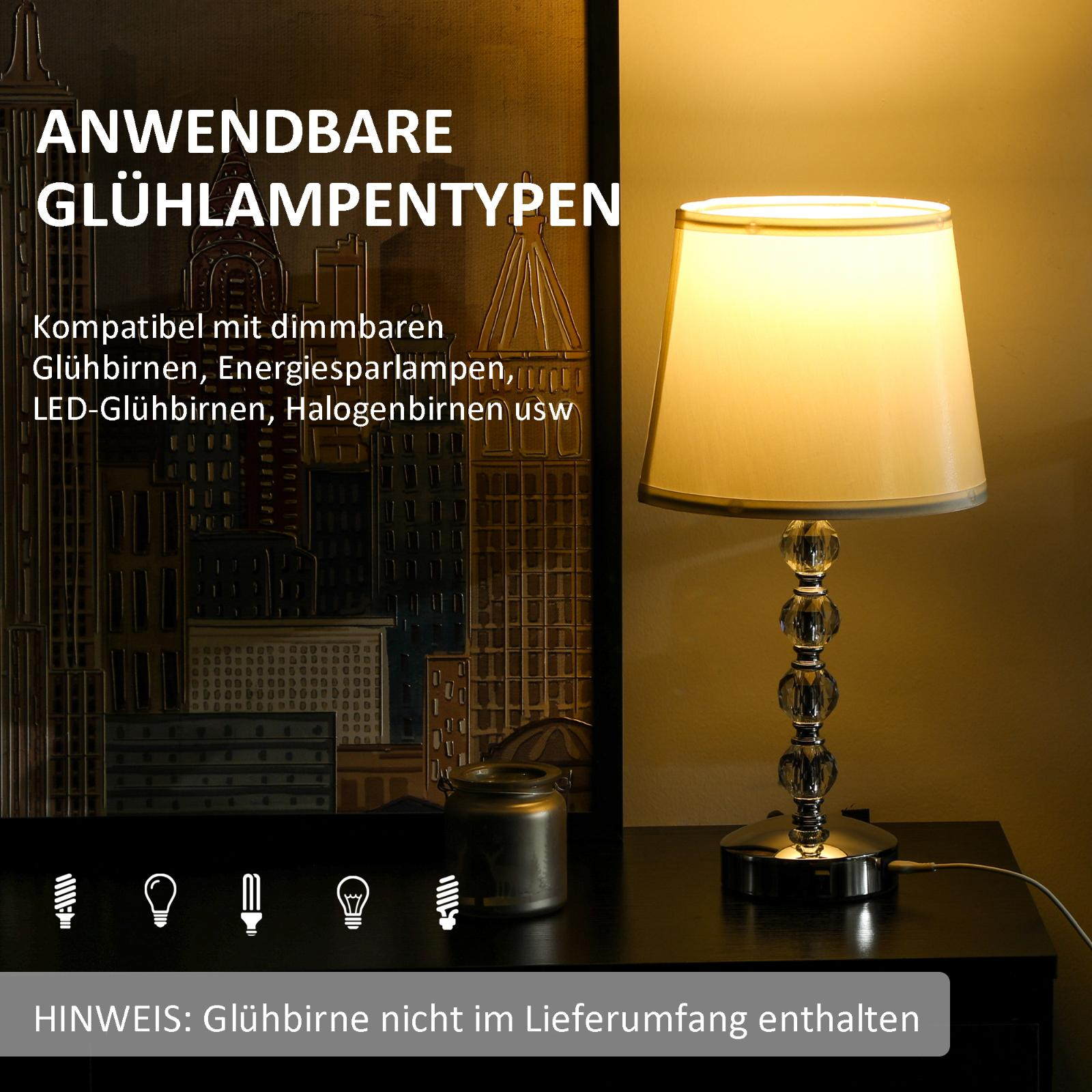 Tischlampe mit weißem Schirm, Kristallfuß. Text über Glühbirnen links.