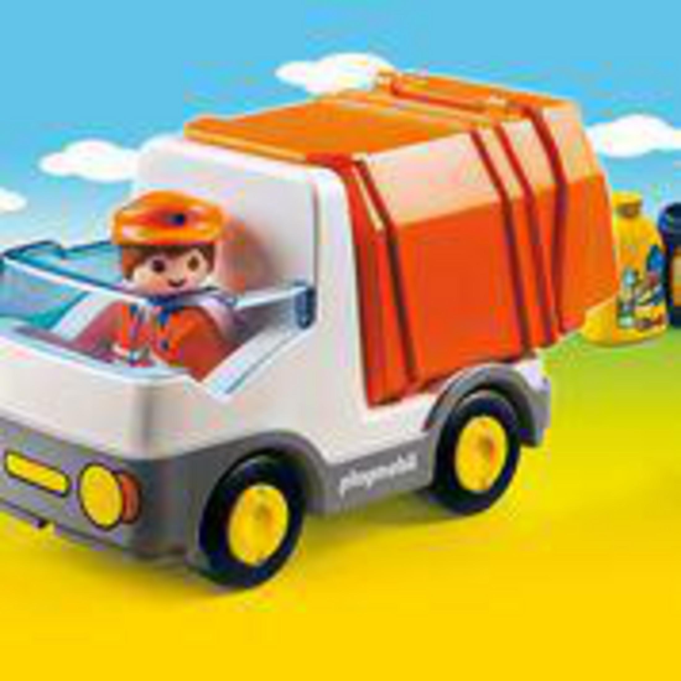 Zabawka śmieciarka Playmobil z kierowcą. Żółto-zielone tło.