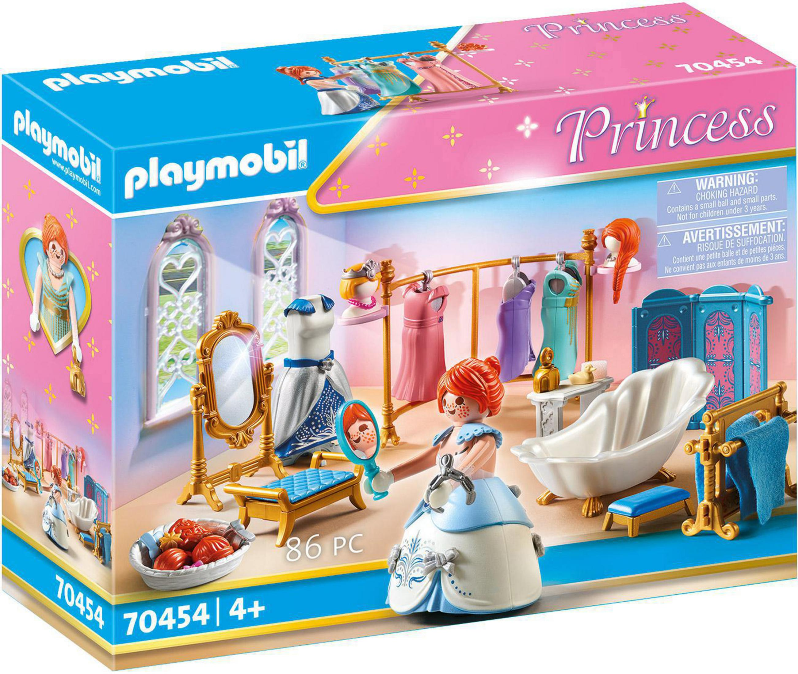 Pudełko zestawu Księżniczki Playmobil z figurkami i akcesoriami. Zawiera zamek, lustro i suknie.