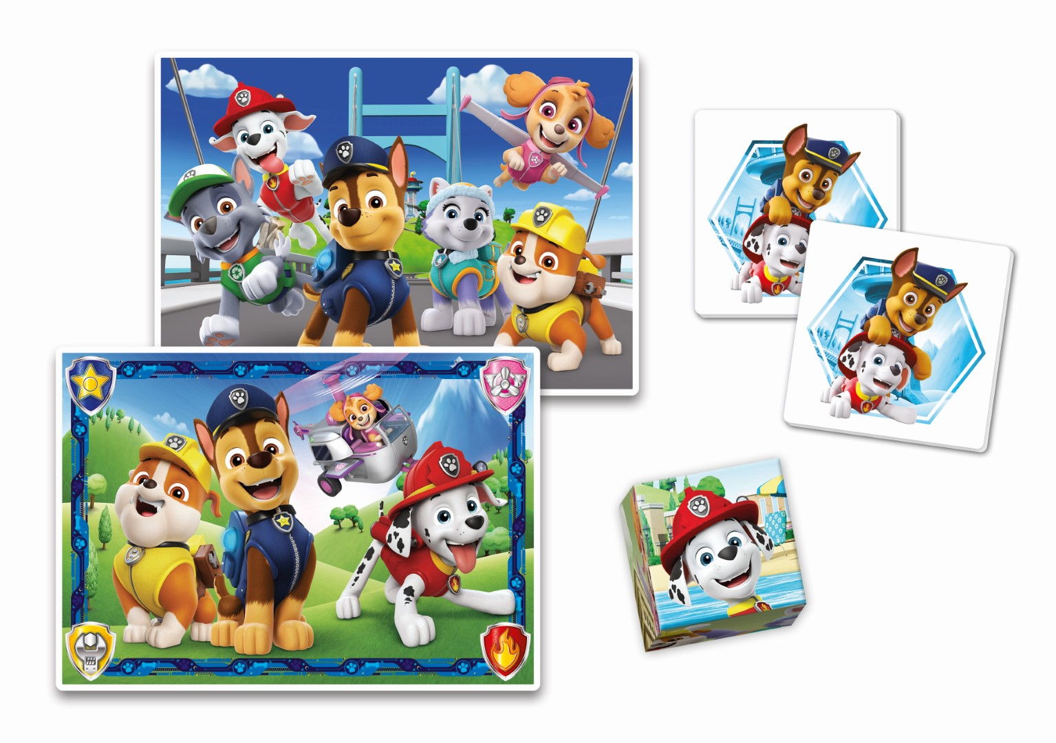 Puzzle i karty Paw Patrol. Puzzle przedstawiają postacie z kreskówek w różnych scenach.