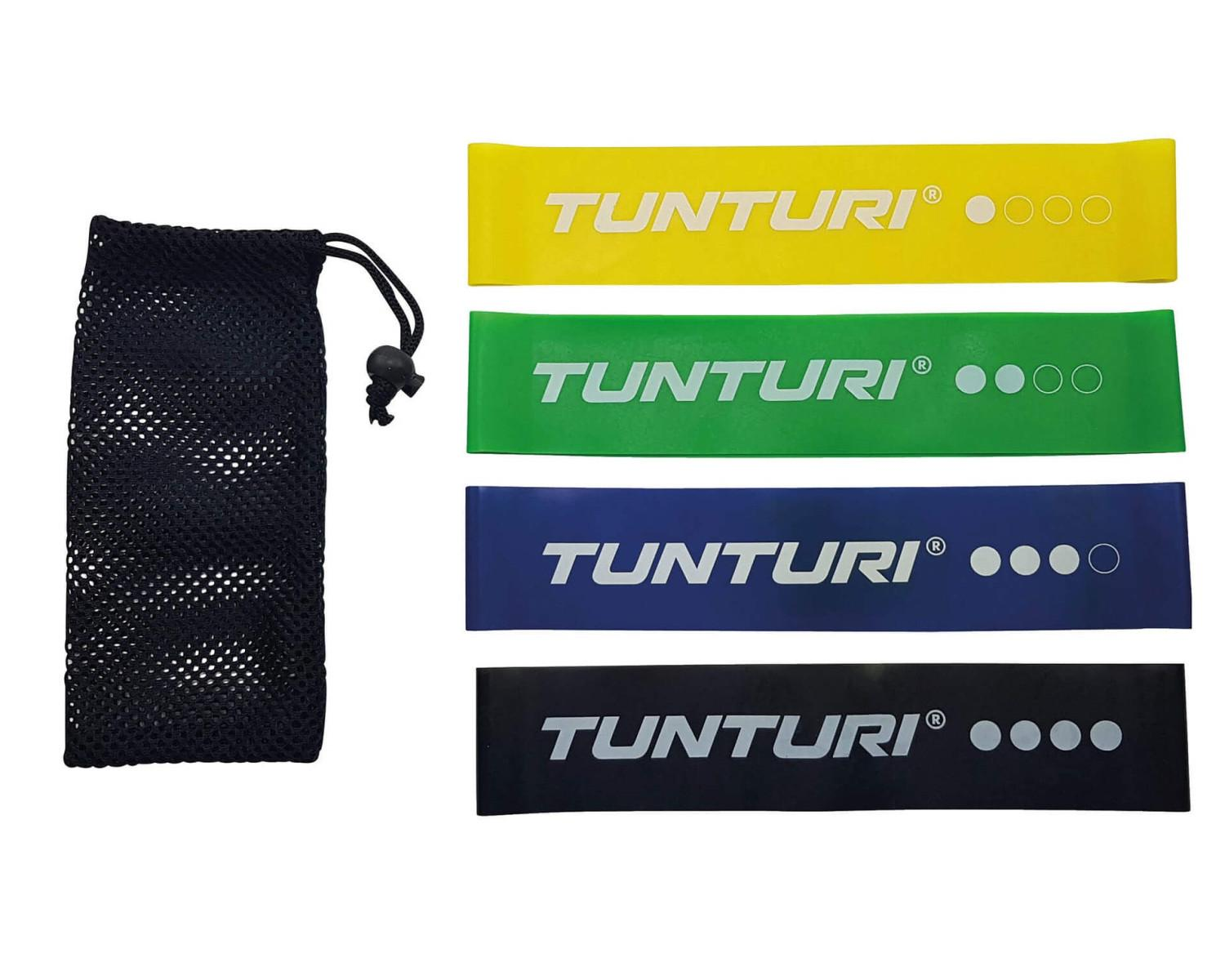 Zestaw taśm oporowych w kolorach żółtym, zielonym, niebieskim i czarnym. Czarny worek z siatki po lewej.